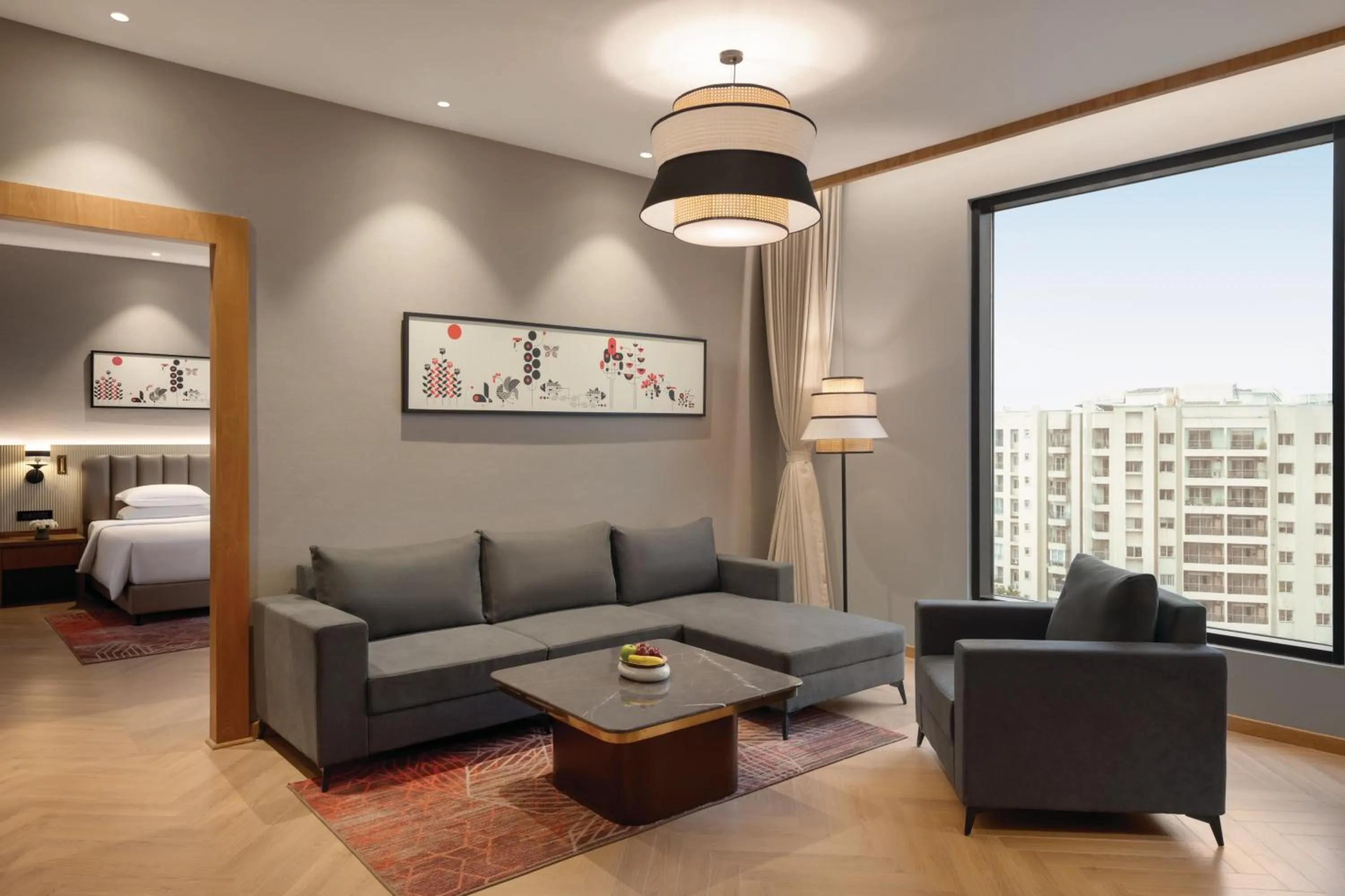 Living room, Bed in Ramada by Wyndham Ranchi