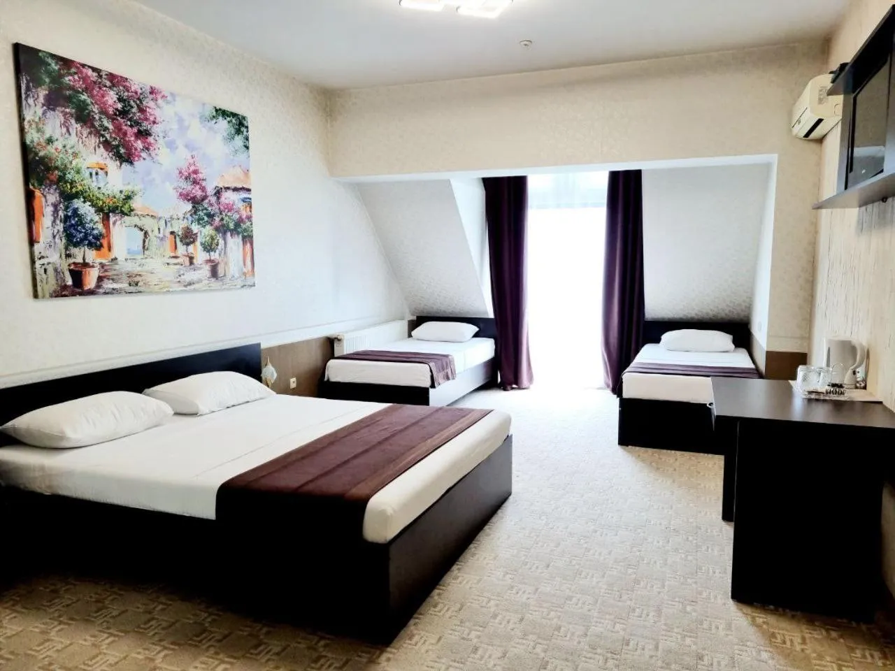 TV and multimedia, Bed in TipTop Hotel CITY CENTER