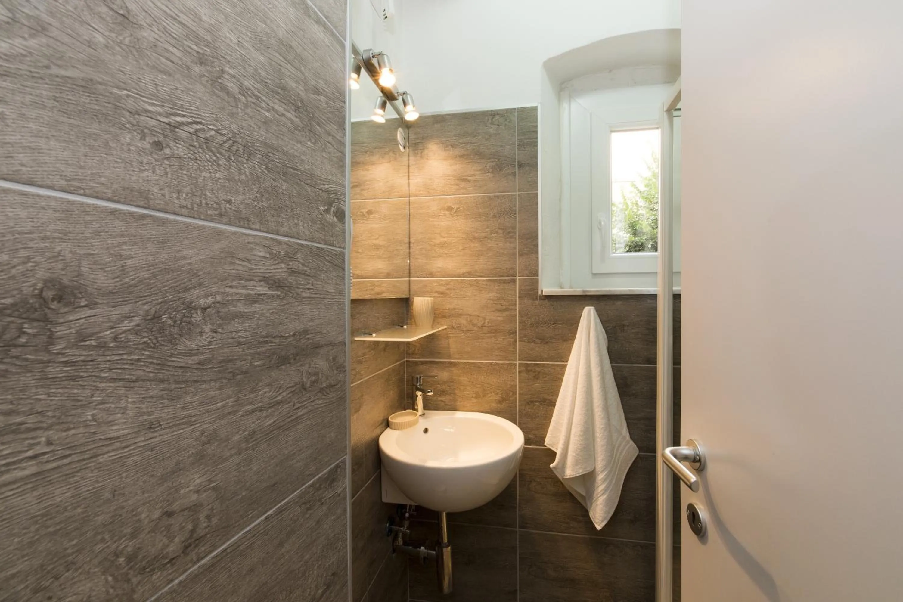 Bathroom in Affittacamere Le Farfalle