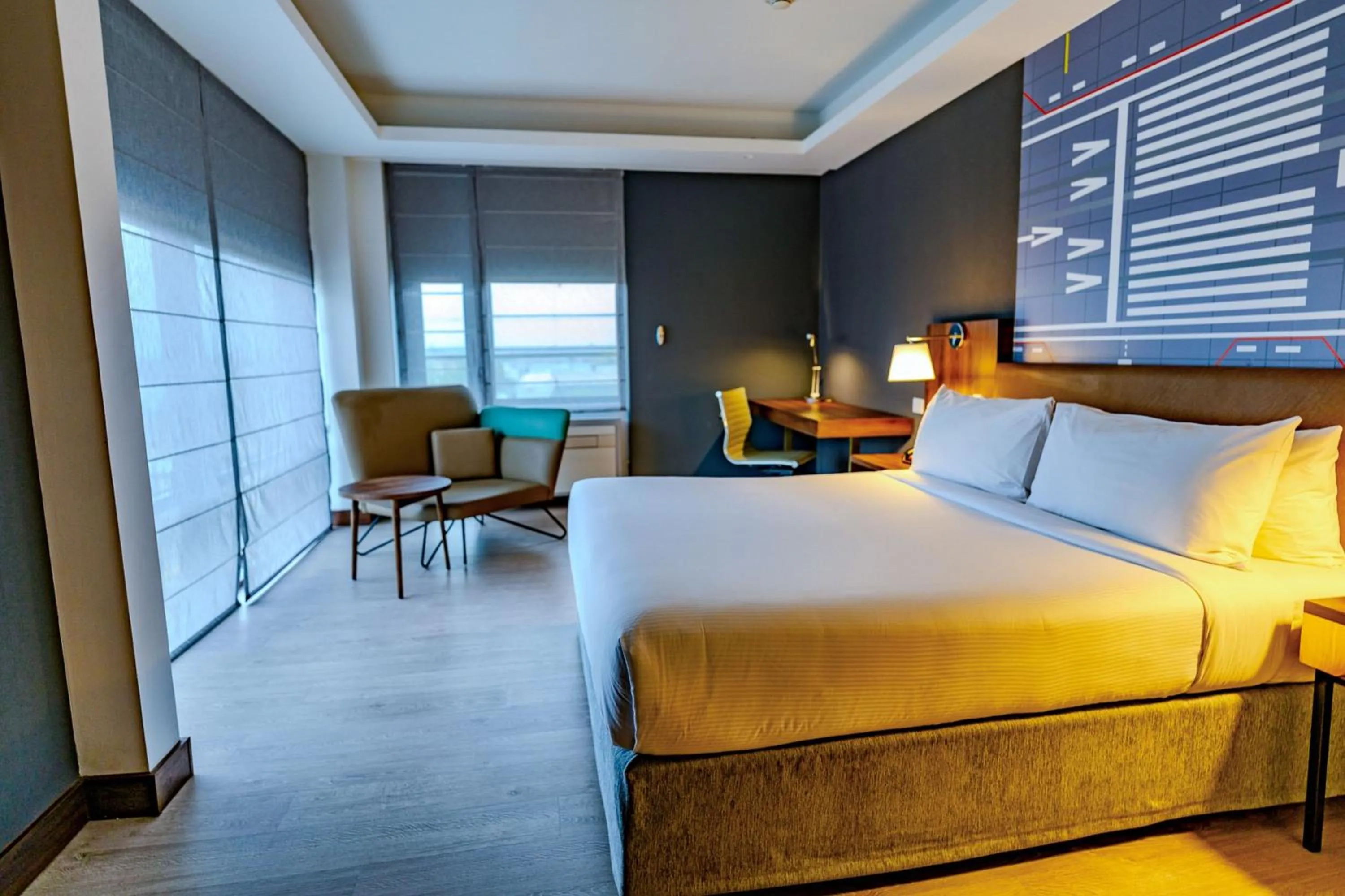 Photo of the whole room, Bed in Courtyard by Marriott Santiago Airport