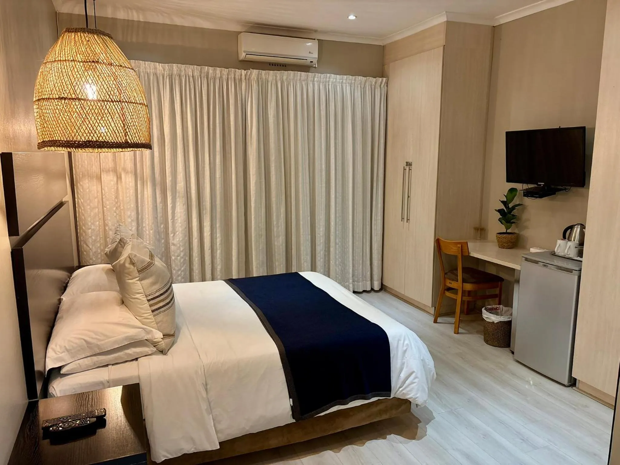 Bed in The Suburban Guest House