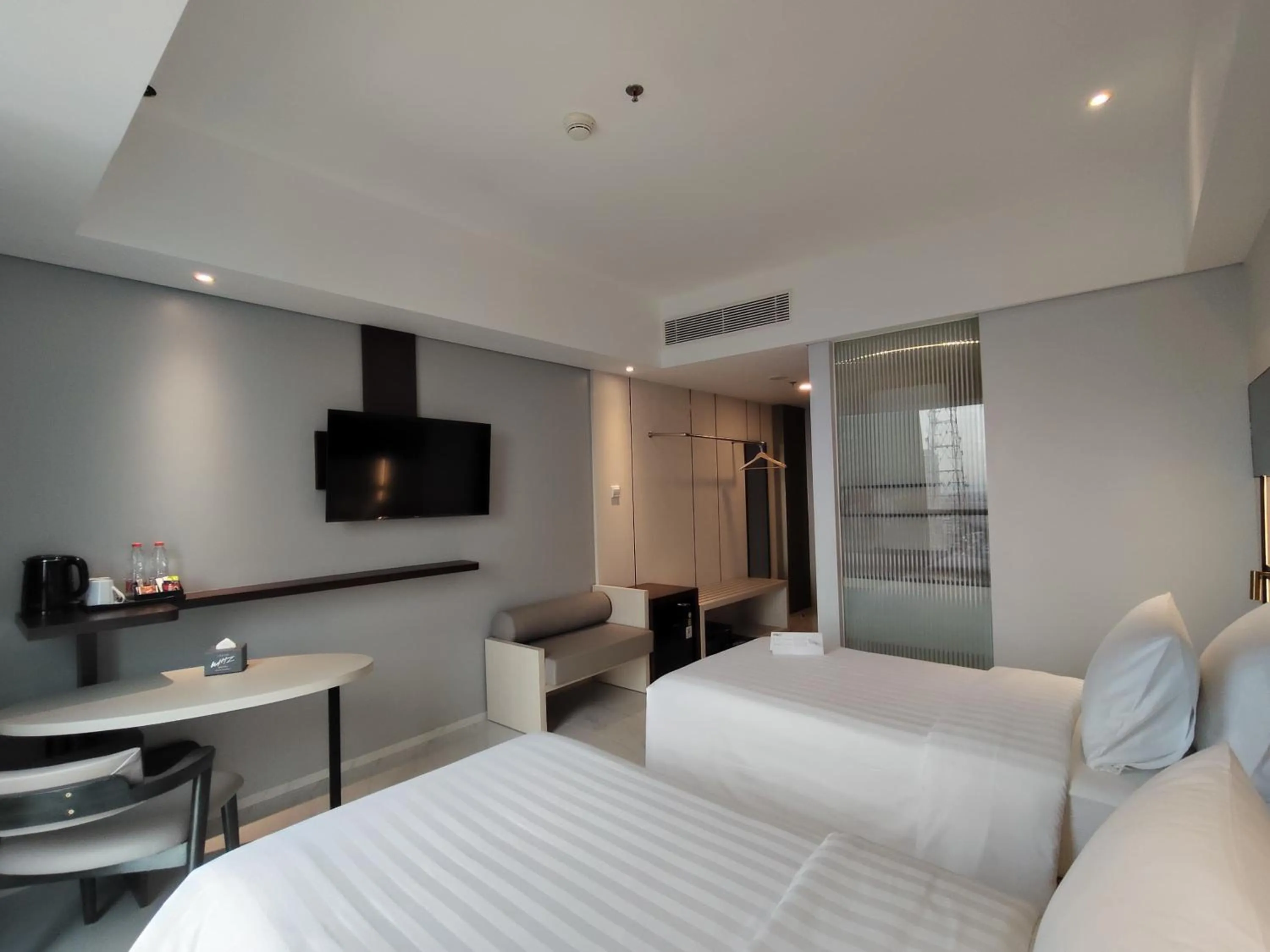 Bedroom, Bed in Grand Whiz Hotel Praxis Surabaya