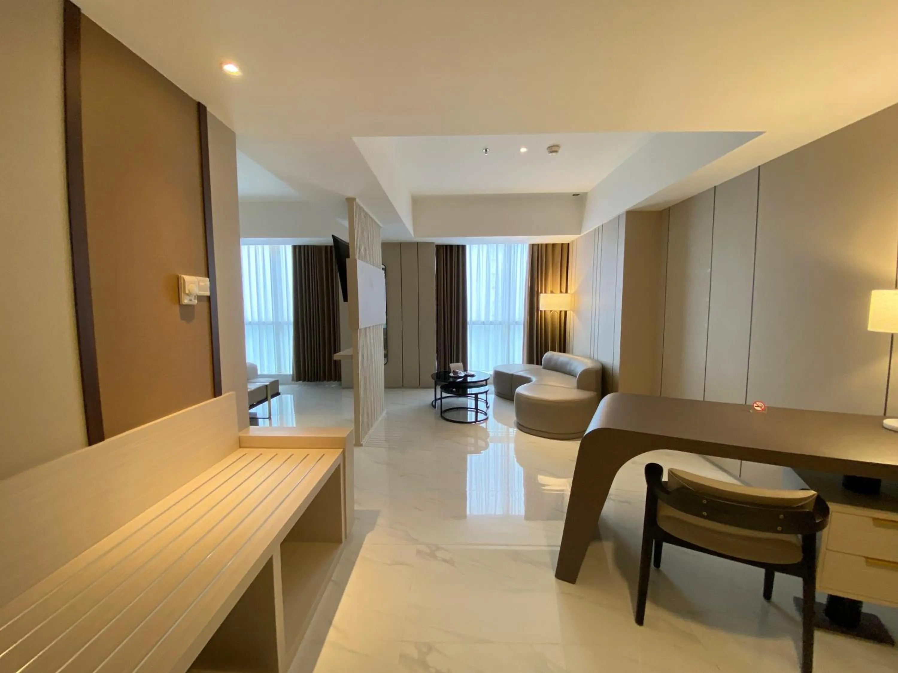 Living room, Bed in Grand Whiz Hotel Praxis Surabaya