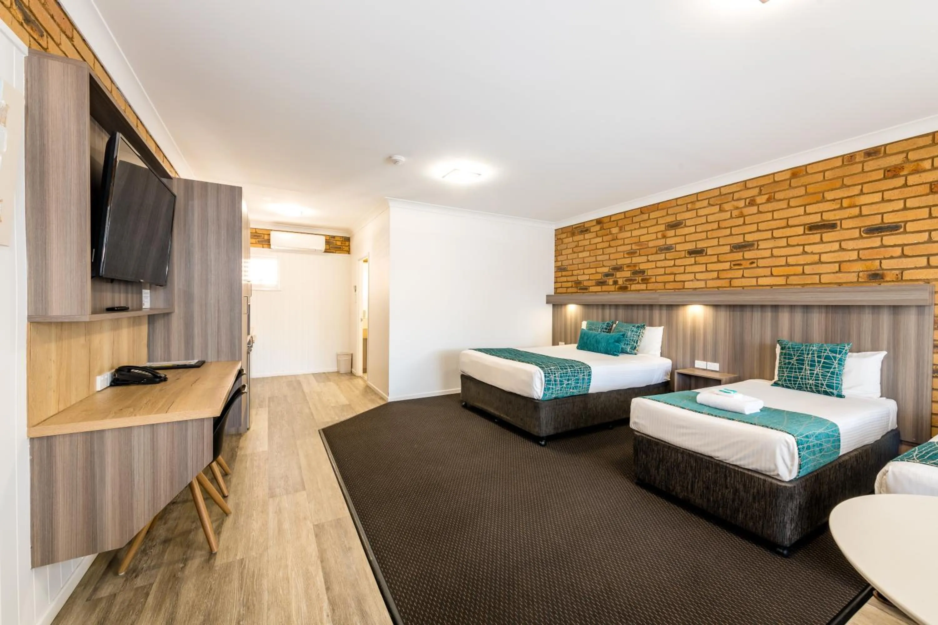 Bed in The Club Motor Inn Chinchilla