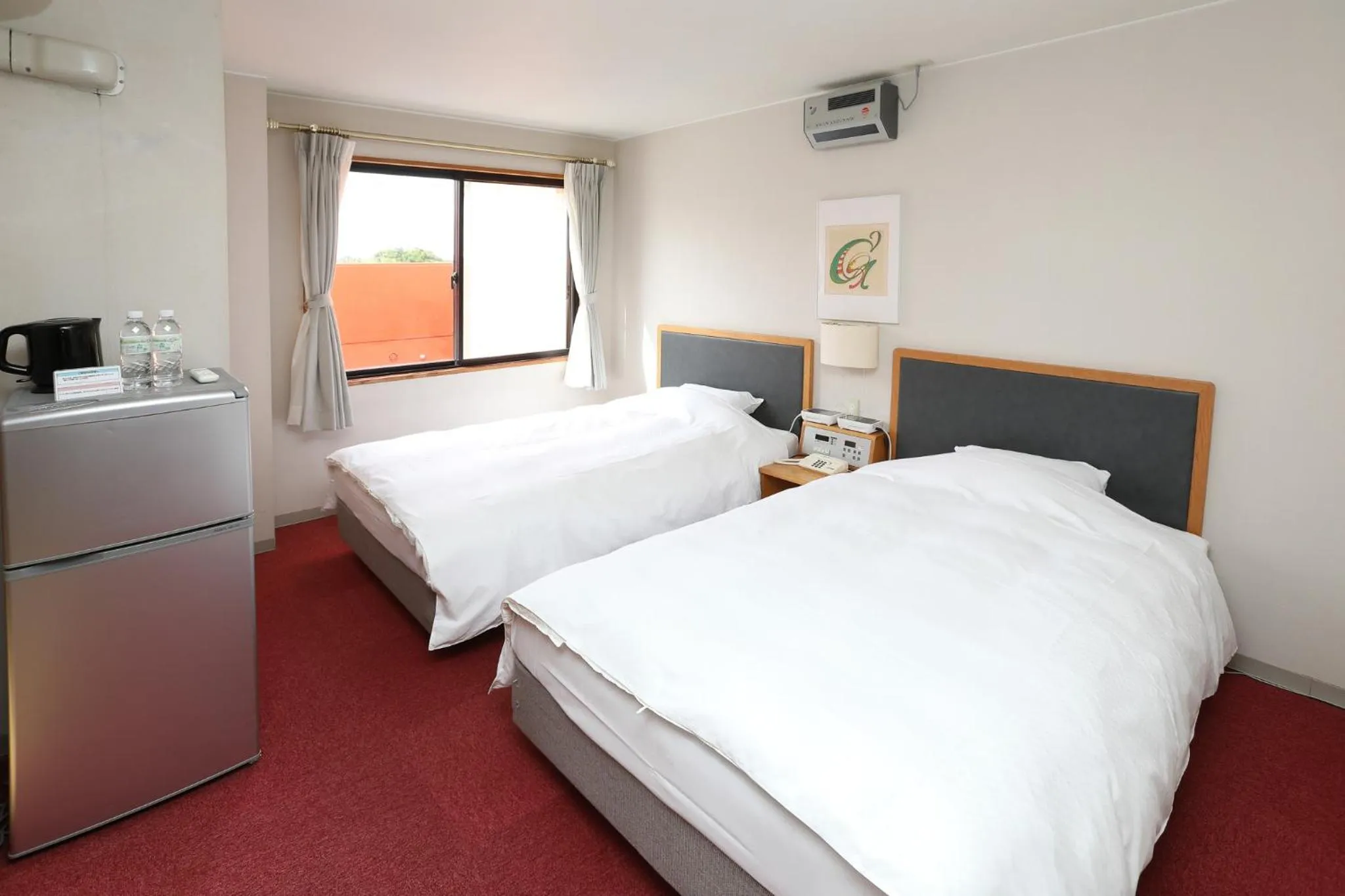 Bed in Hotel Sunresort Shirahama