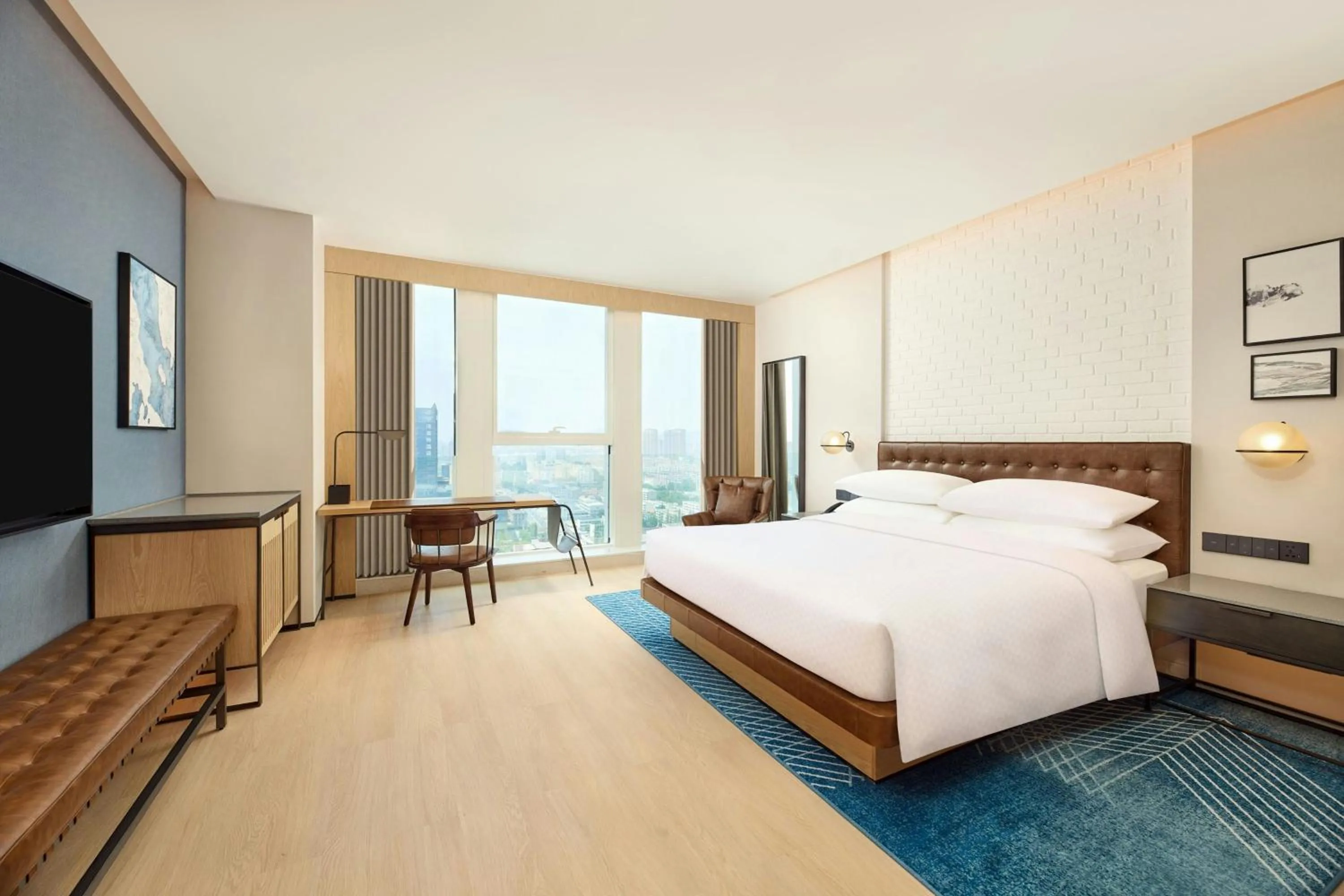 Photo of the whole room, Bed in Four Points by Sheraton Rizhao