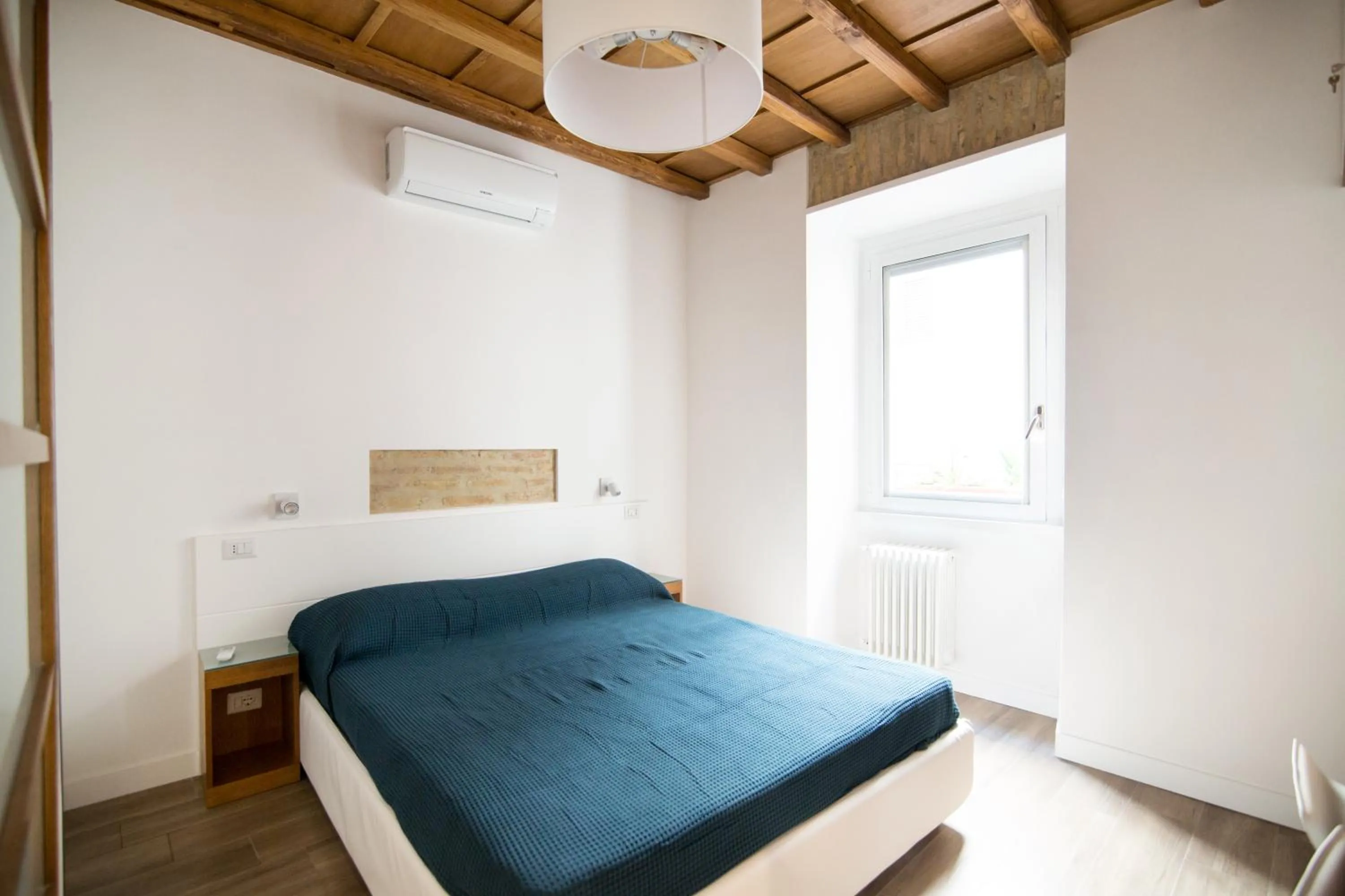 Bed in Domenichino Luxury Home