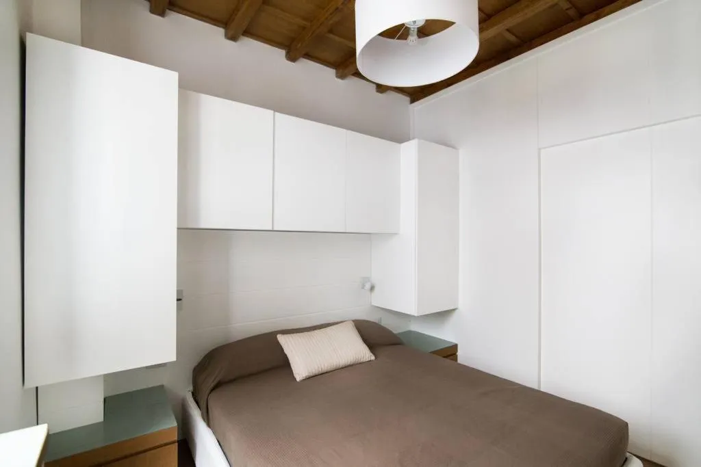 Bed in Domenichino Luxury Home