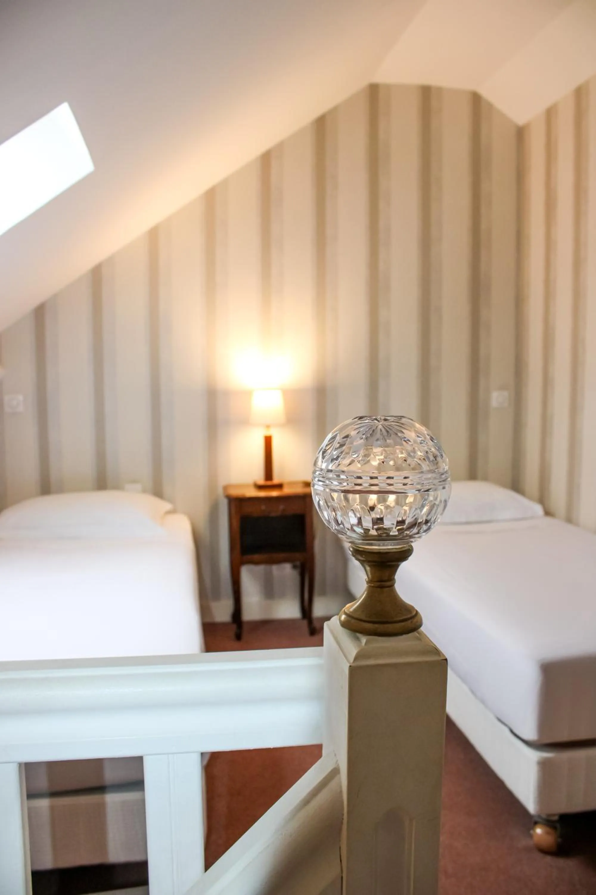 Bed in Hotel La Villa Fleurie