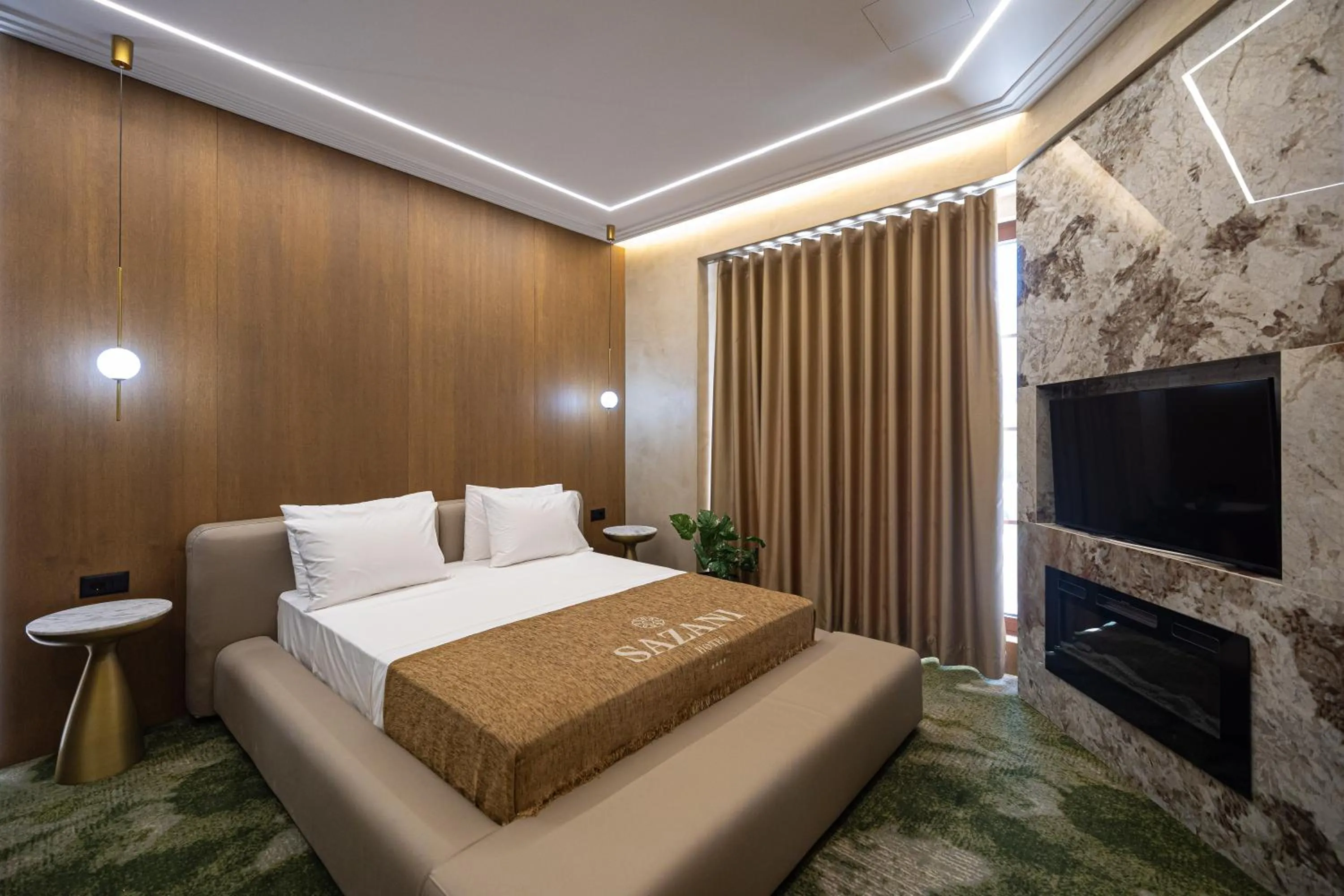 TV and multimedia, Bed in Sazani Hotel