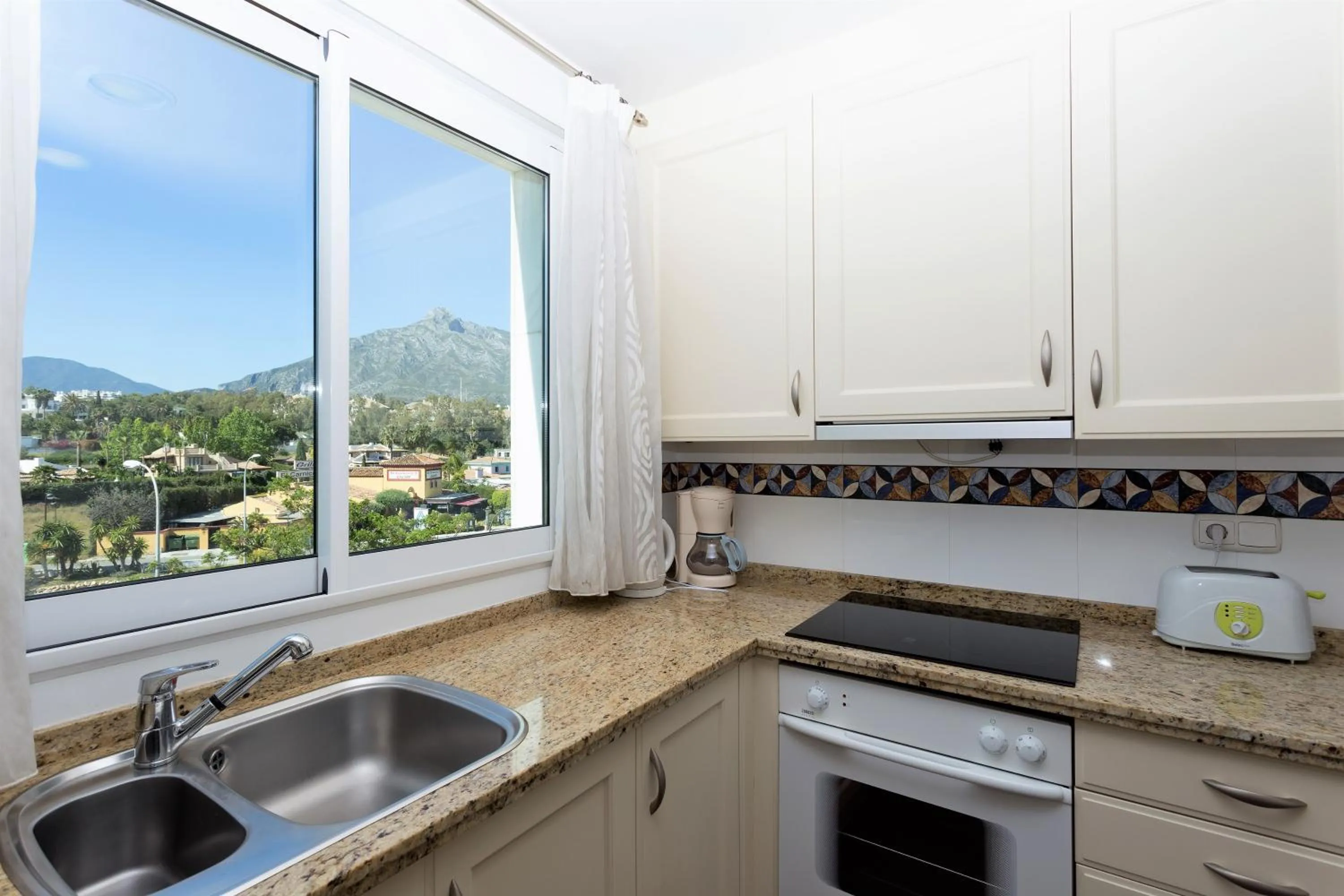 kitchen in Coral Beach Aparthotel