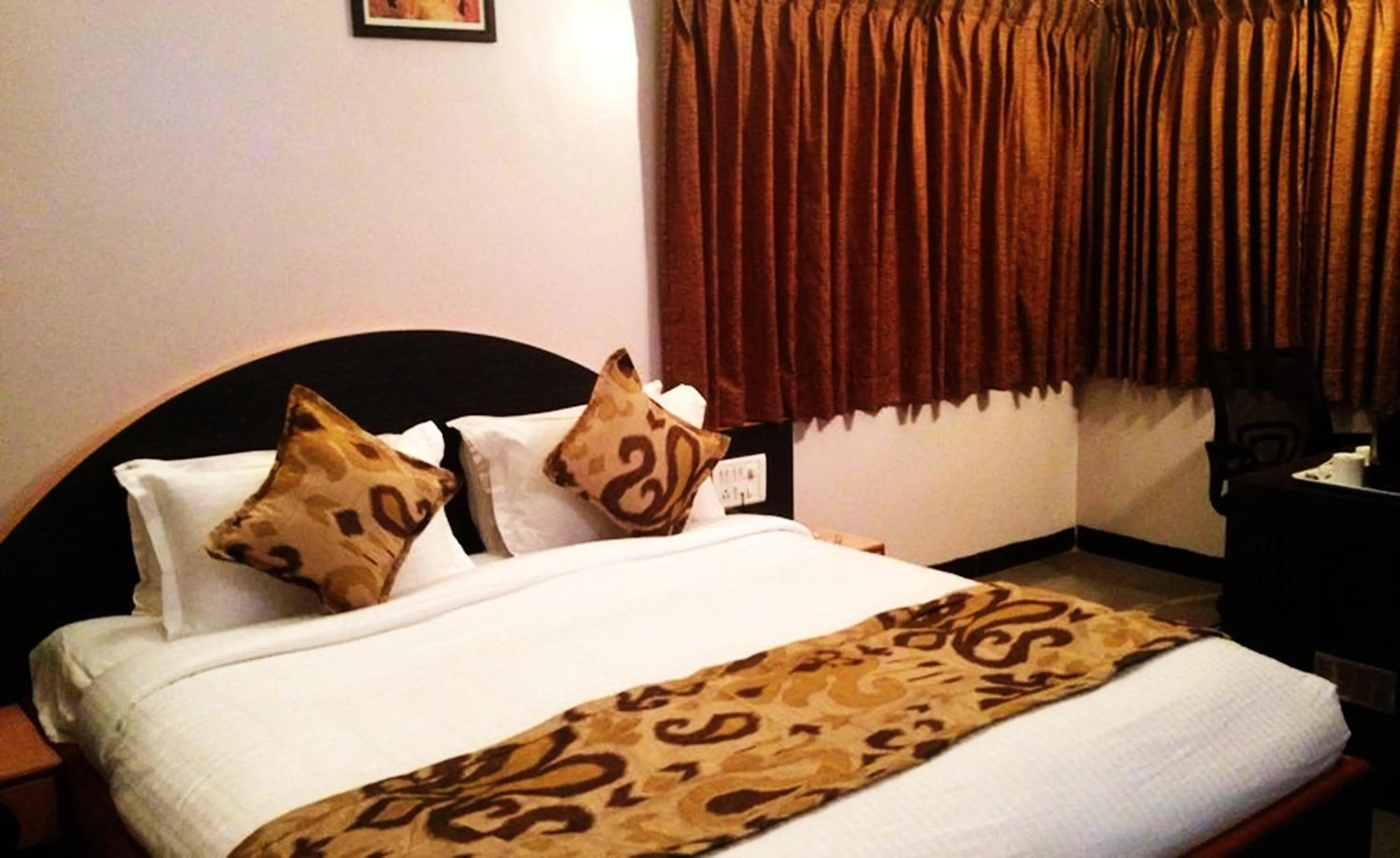 Bedroom in Cotton County Club and Resort