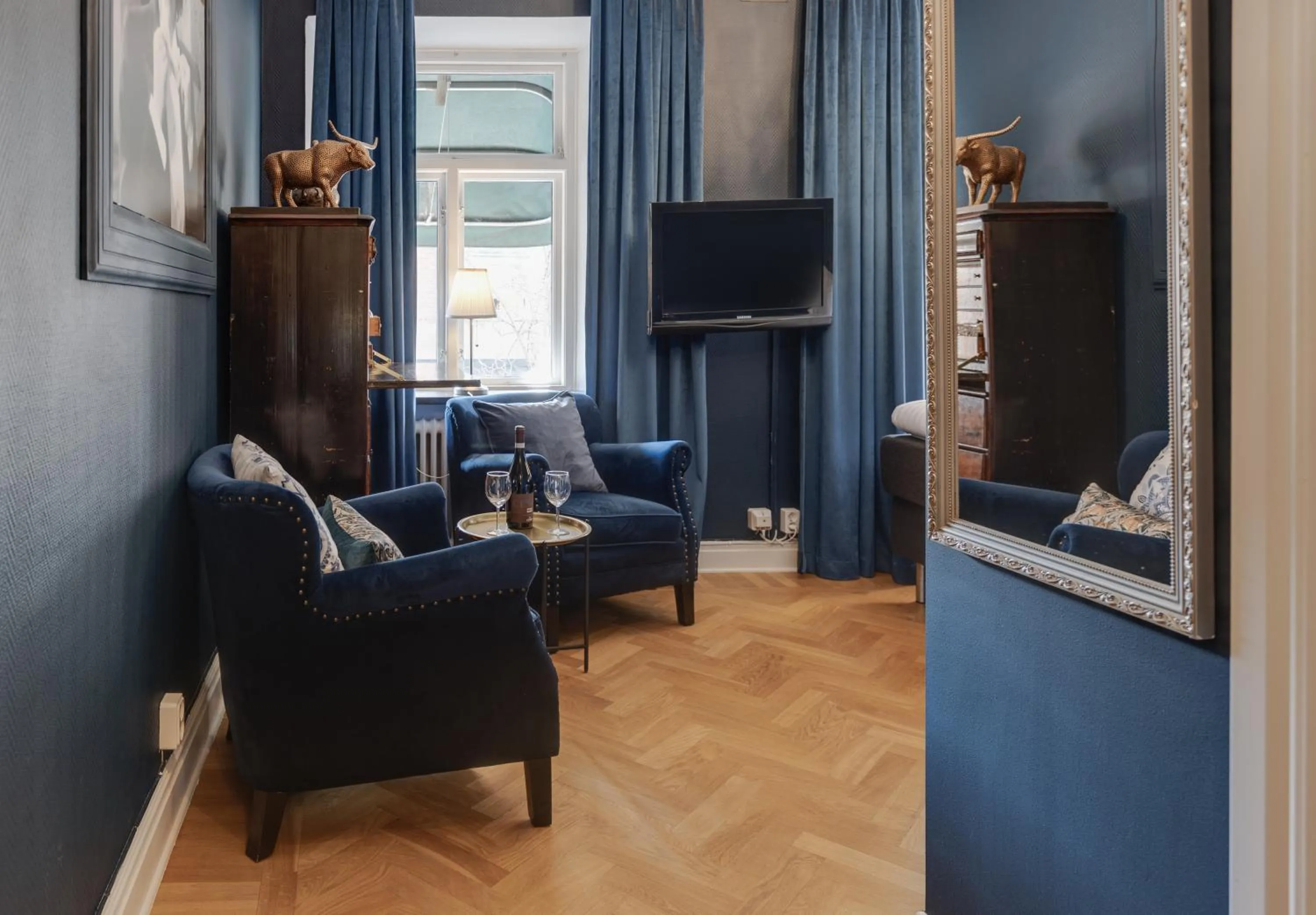 Living room in Cameo Boutique Hotell