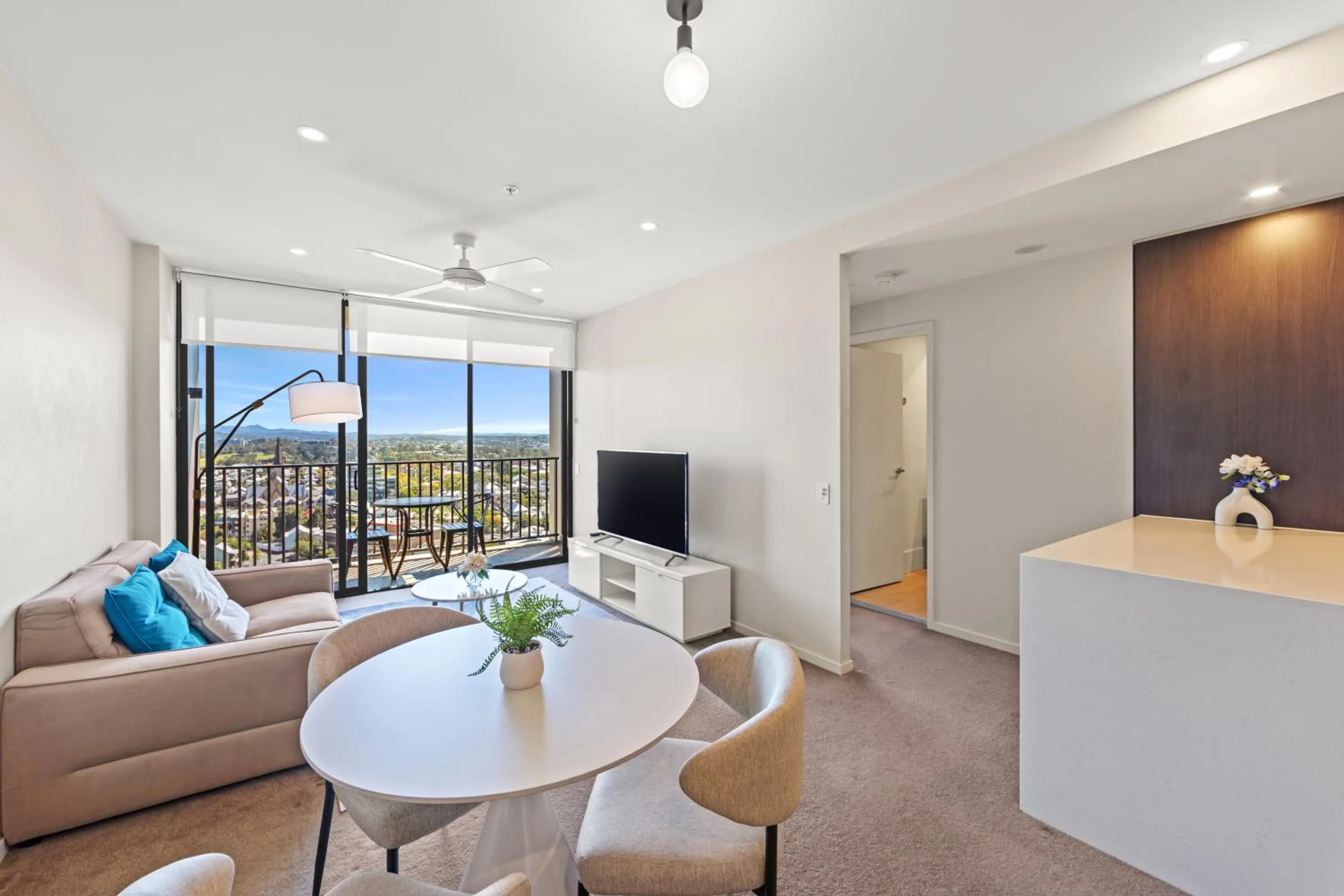 Living room in Spire Residences by CLLIX