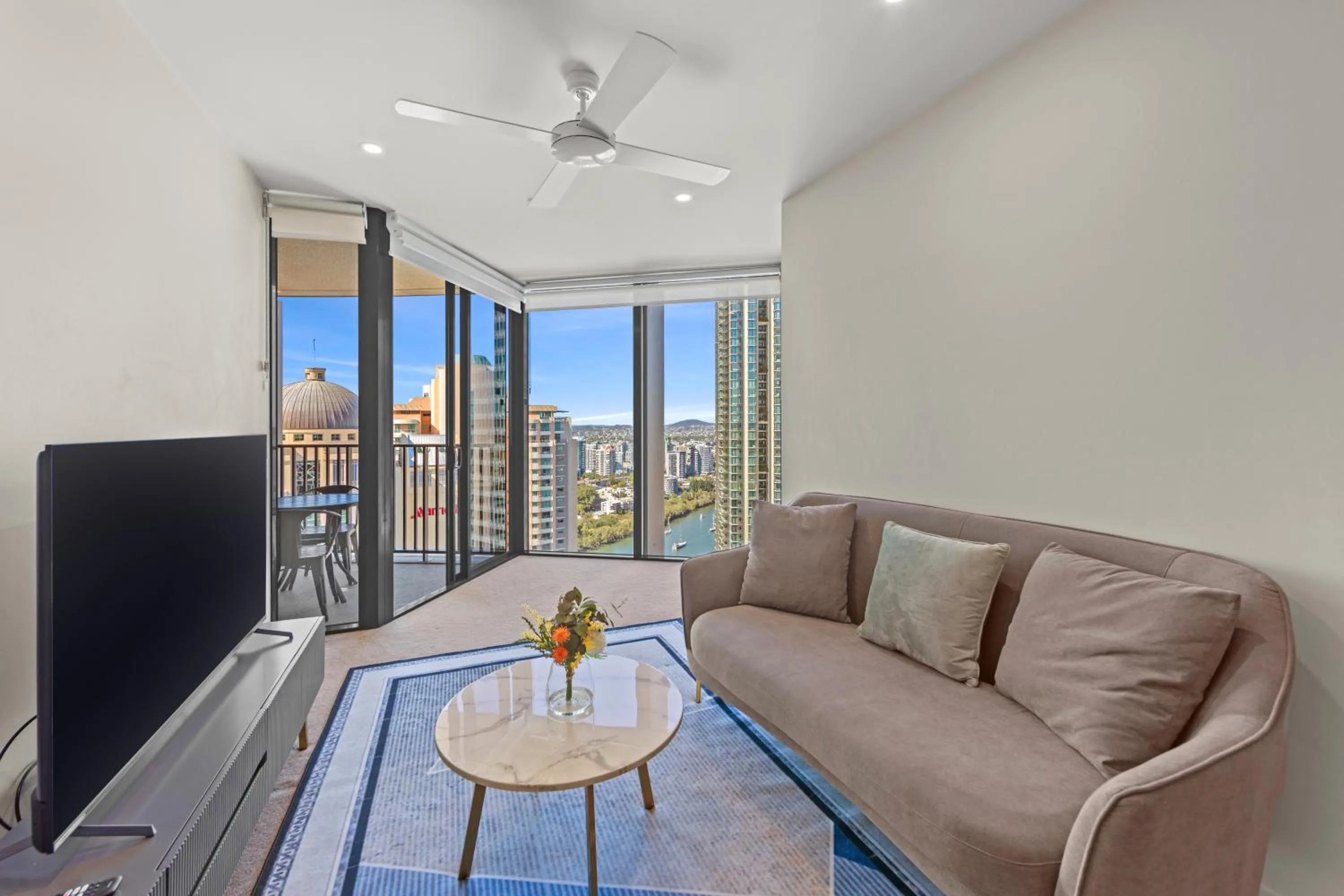 Living room in Spire Residences by CLLIX