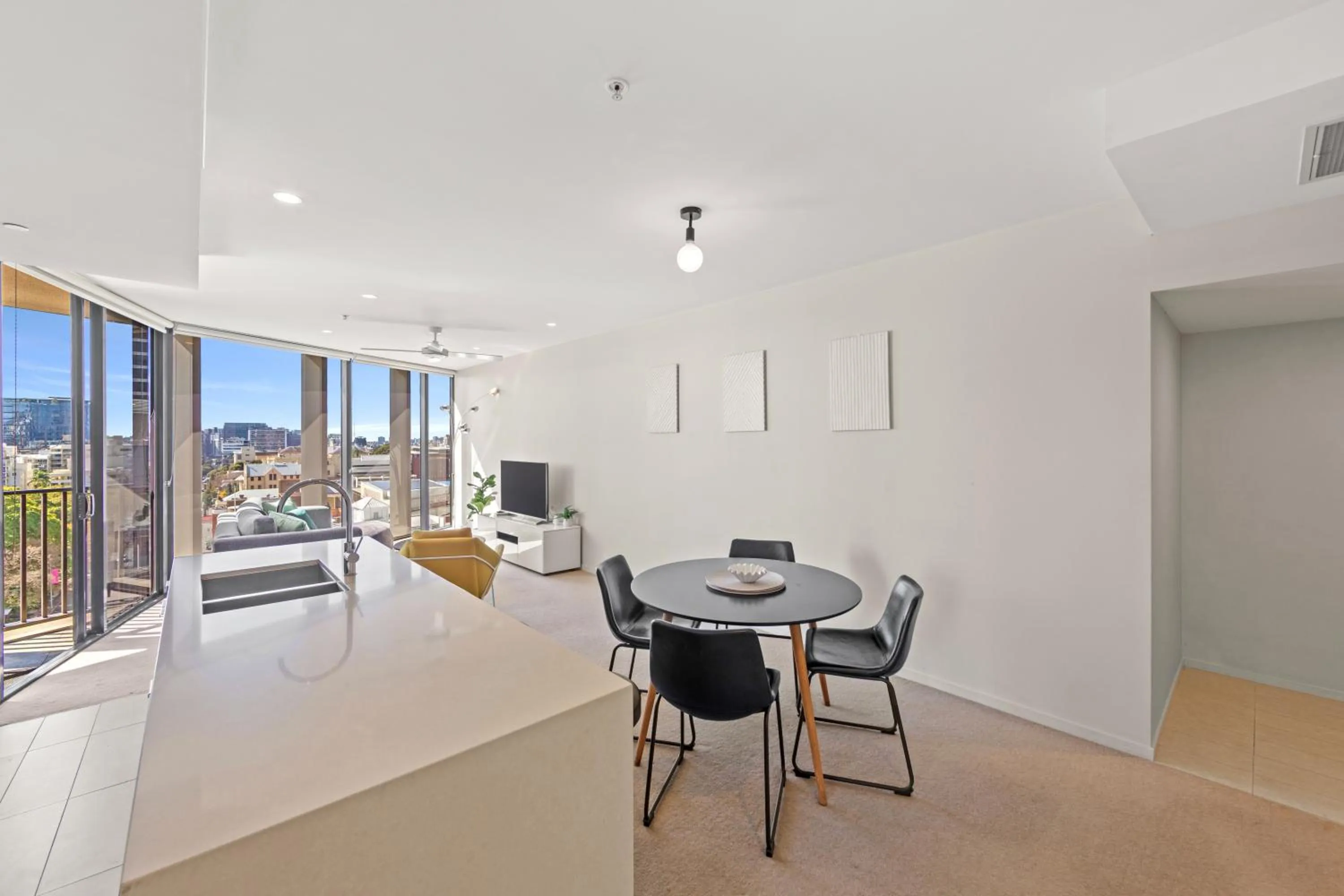 Living room in Spire Residences by CLLIX