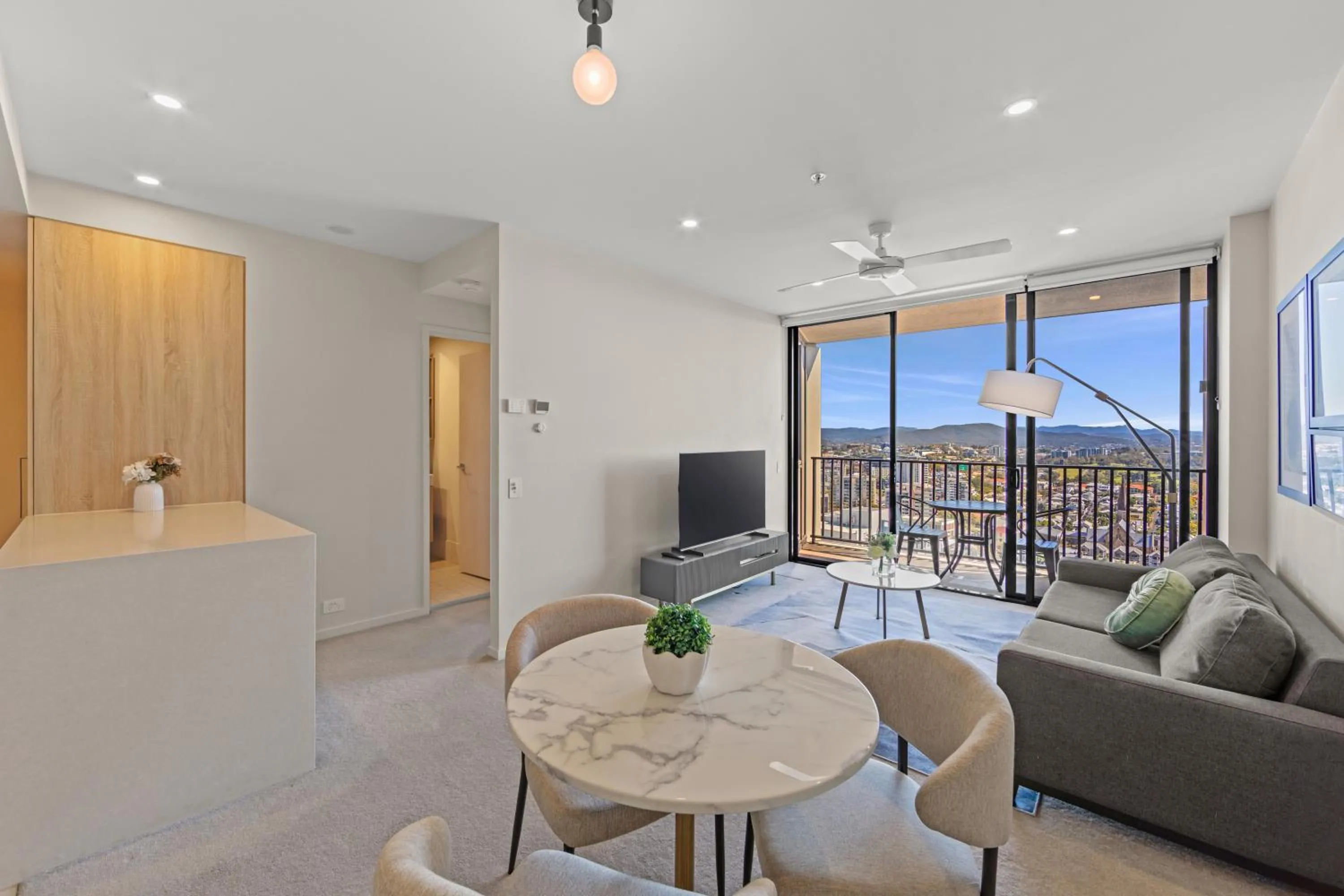 Living room in Spire Residences by CLLIX