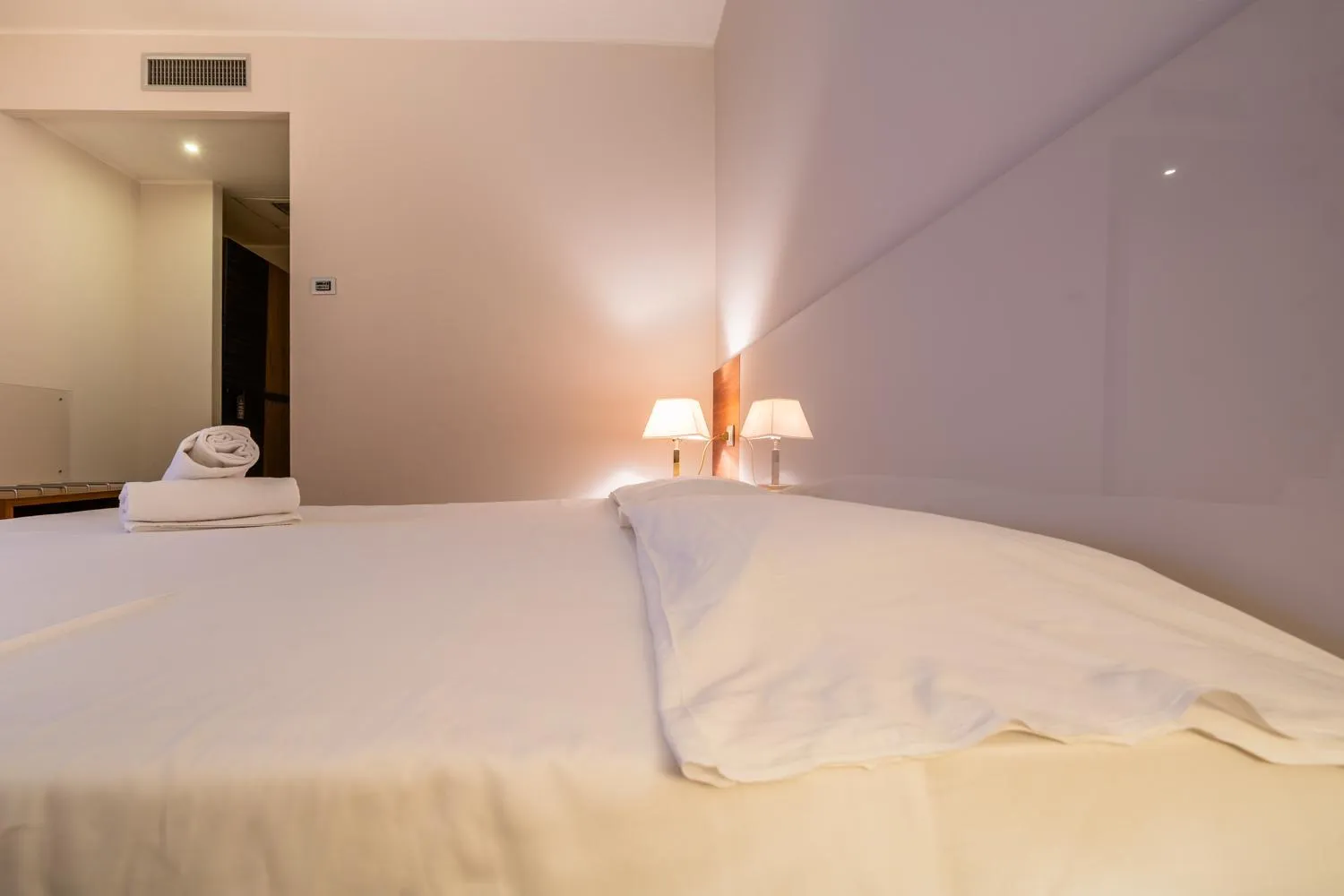 Bed in Capo Peloro Hotel