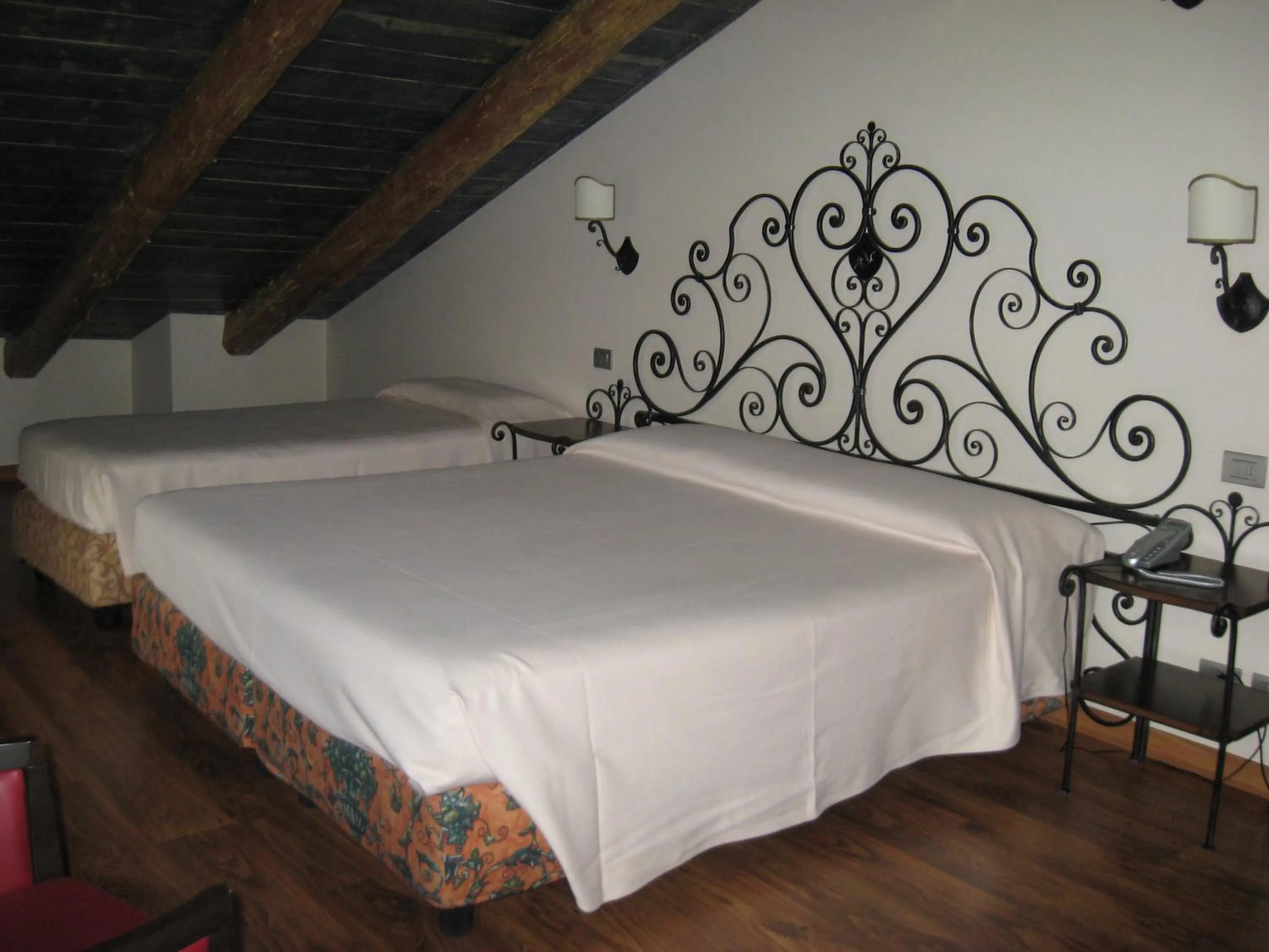 Bed in Albergo Venturelli