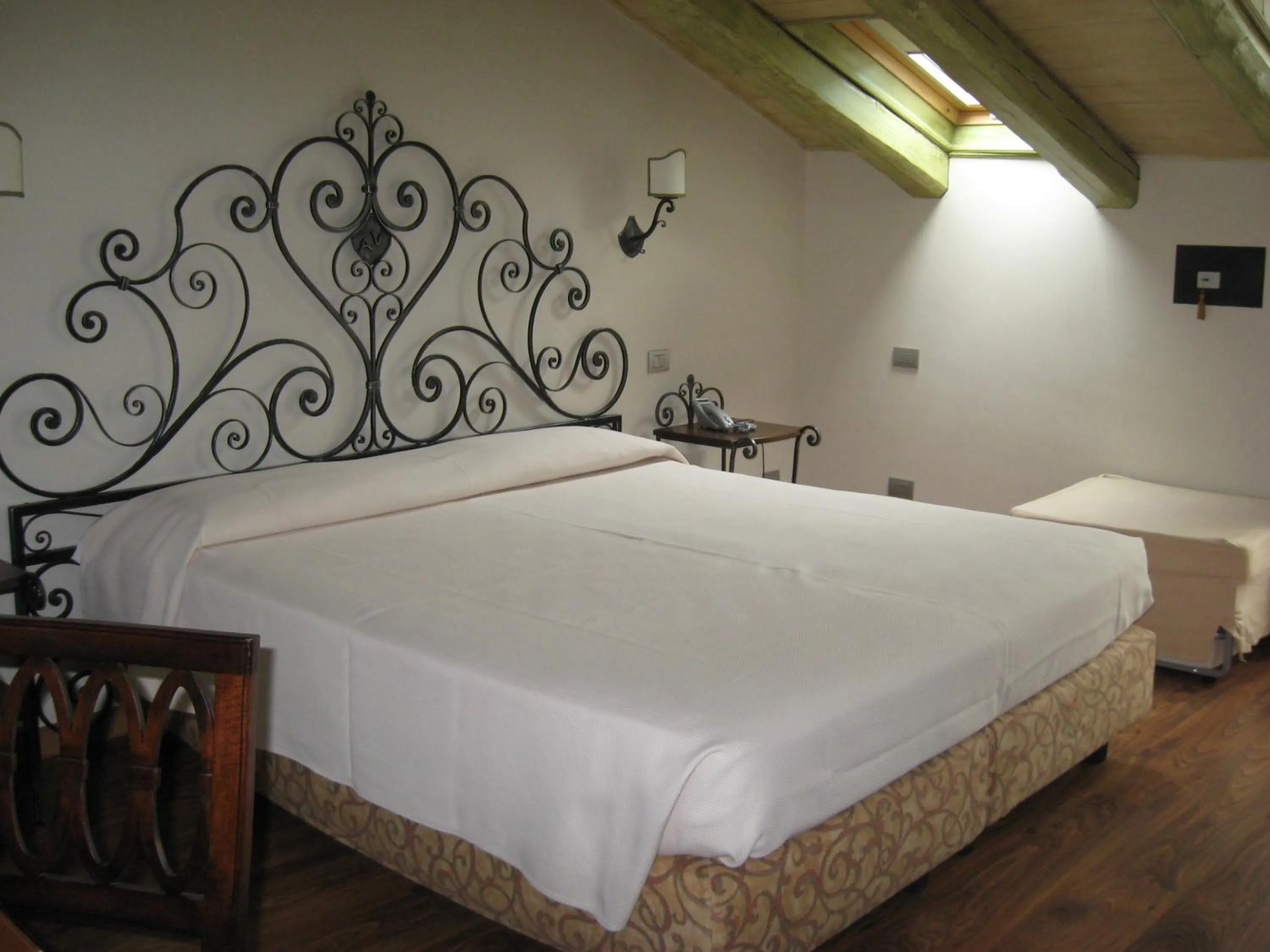Bed in Albergo Venturelli