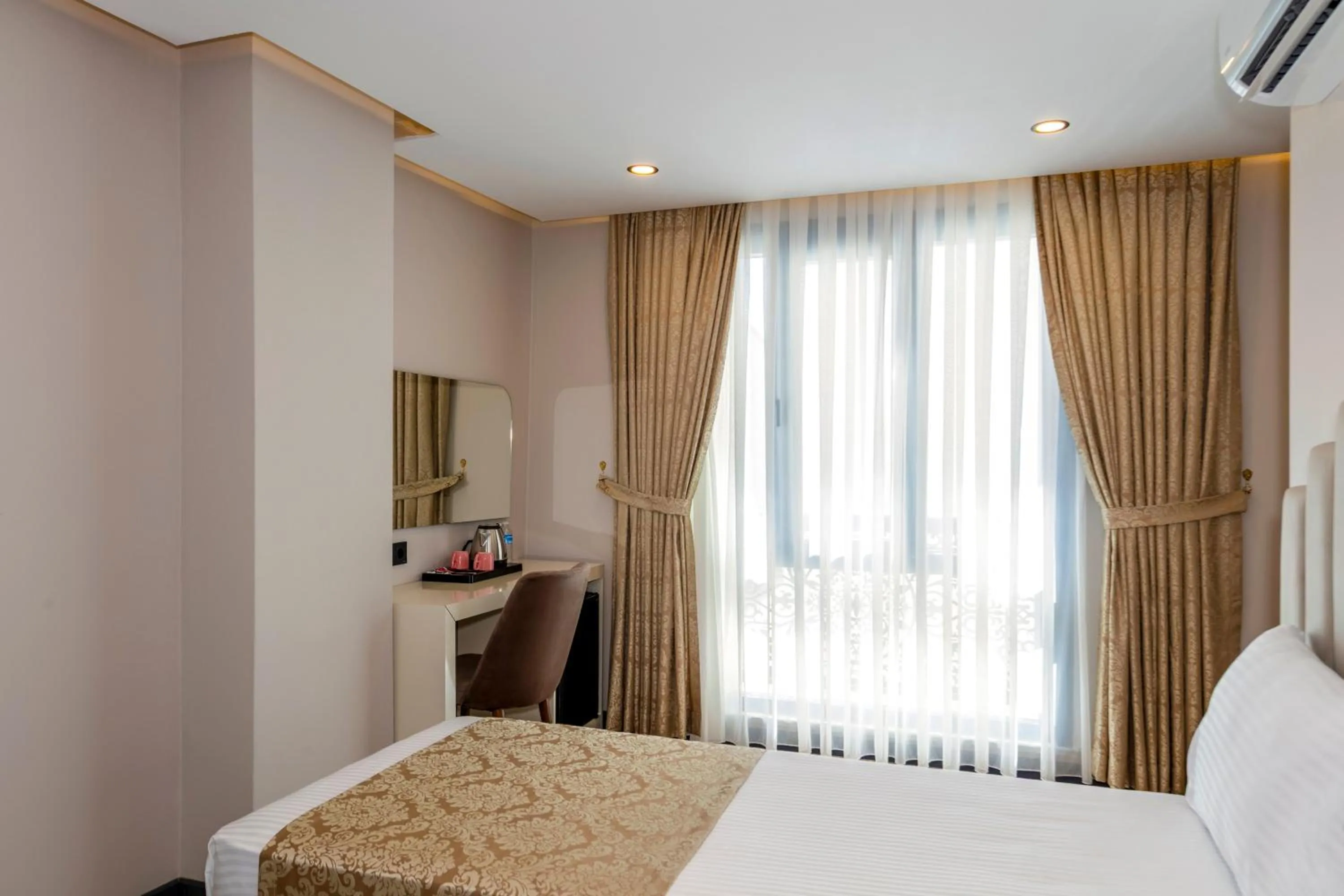 Photo of the whole room, Bed in HillTown Airport Hotel & Restaurant