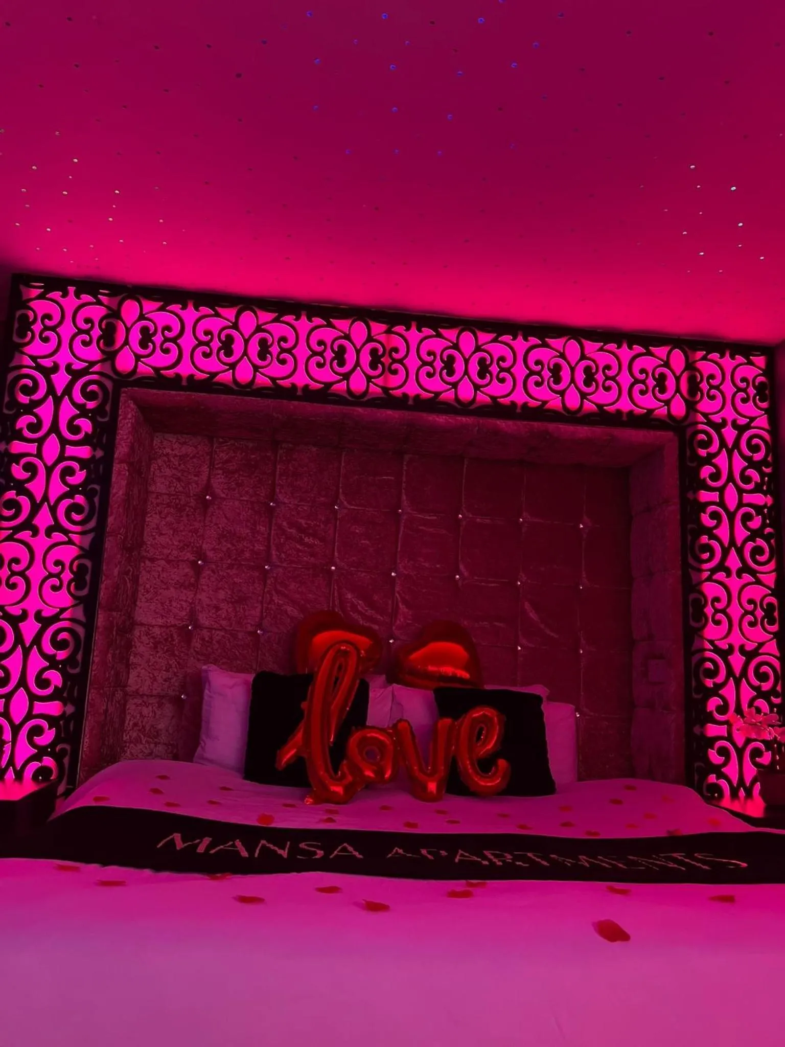 Bedroom in Mansa Apartments