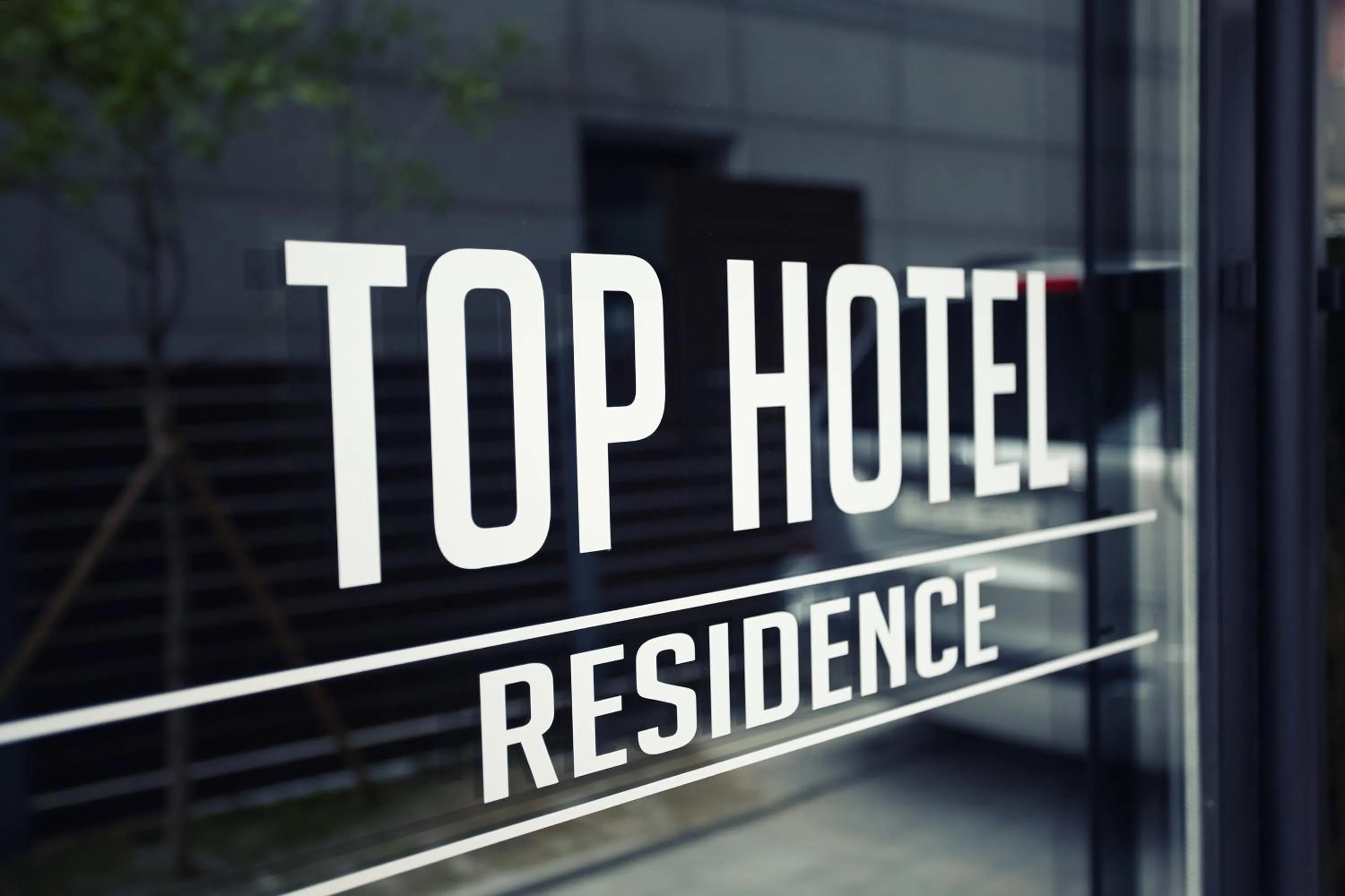 Property building in Top Hotel & Residence