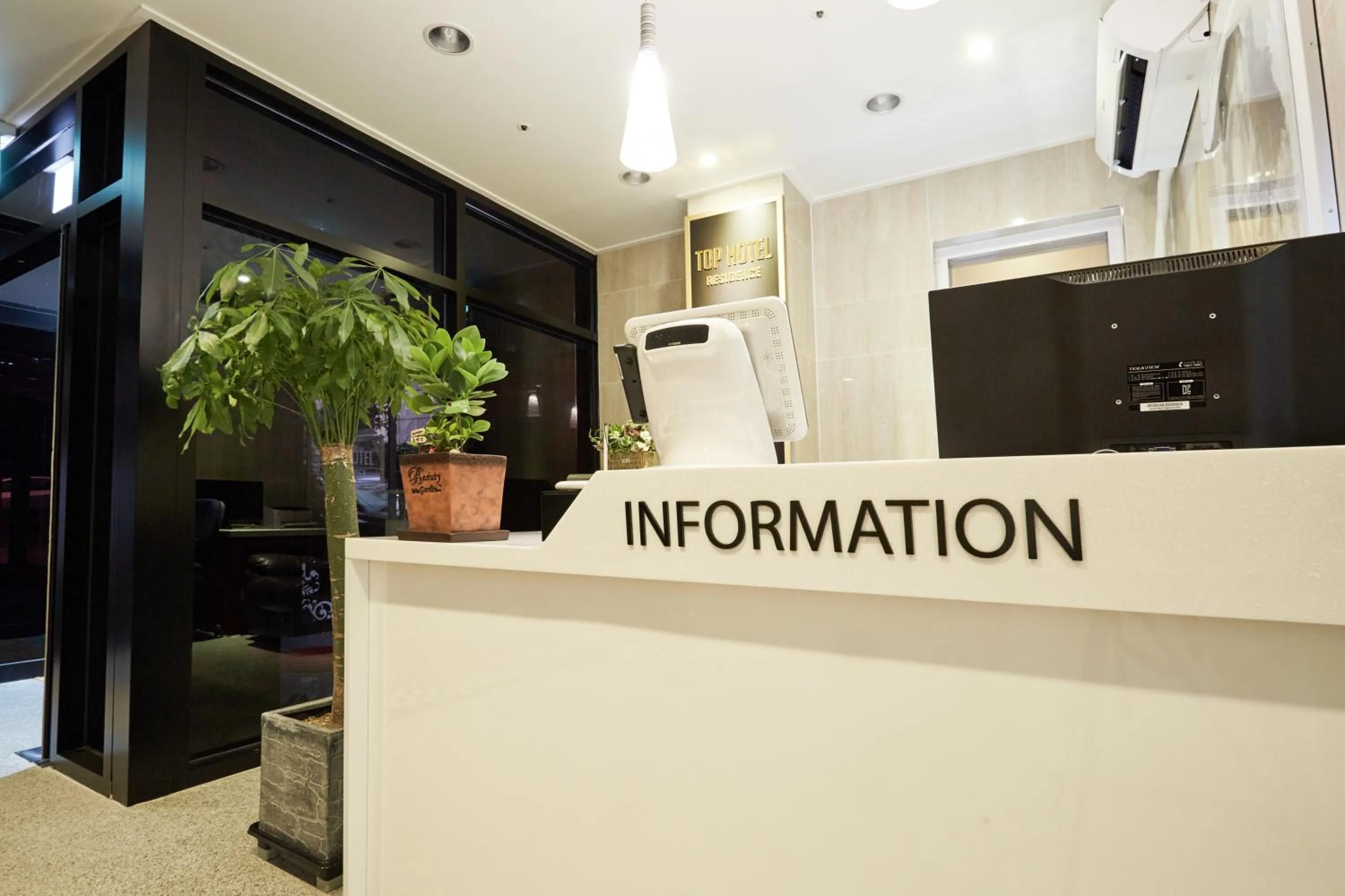 Lobby or reception in Top Hotel & Residence