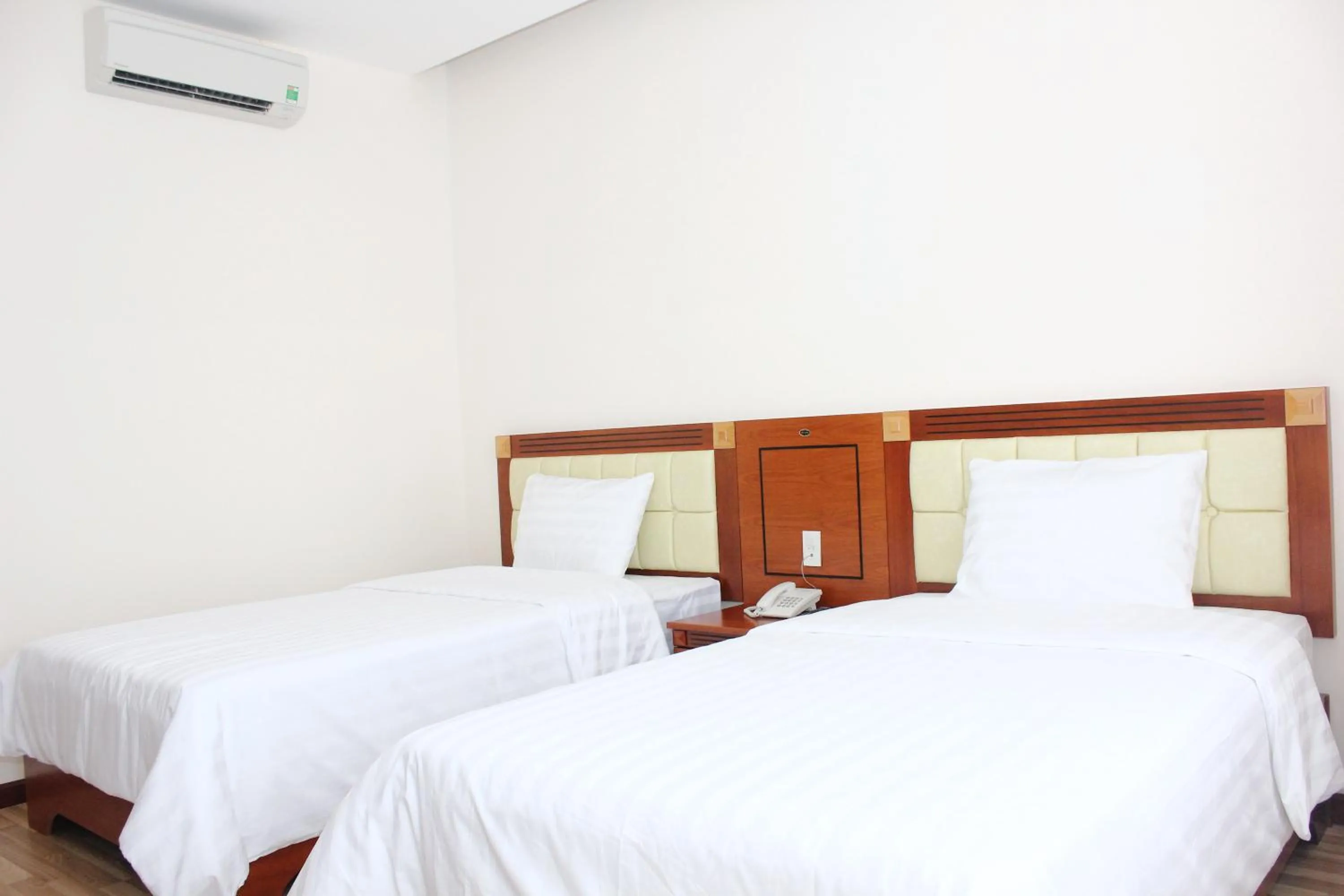 Photo of the whole room, Bed in Hoang Ngoc Hotel