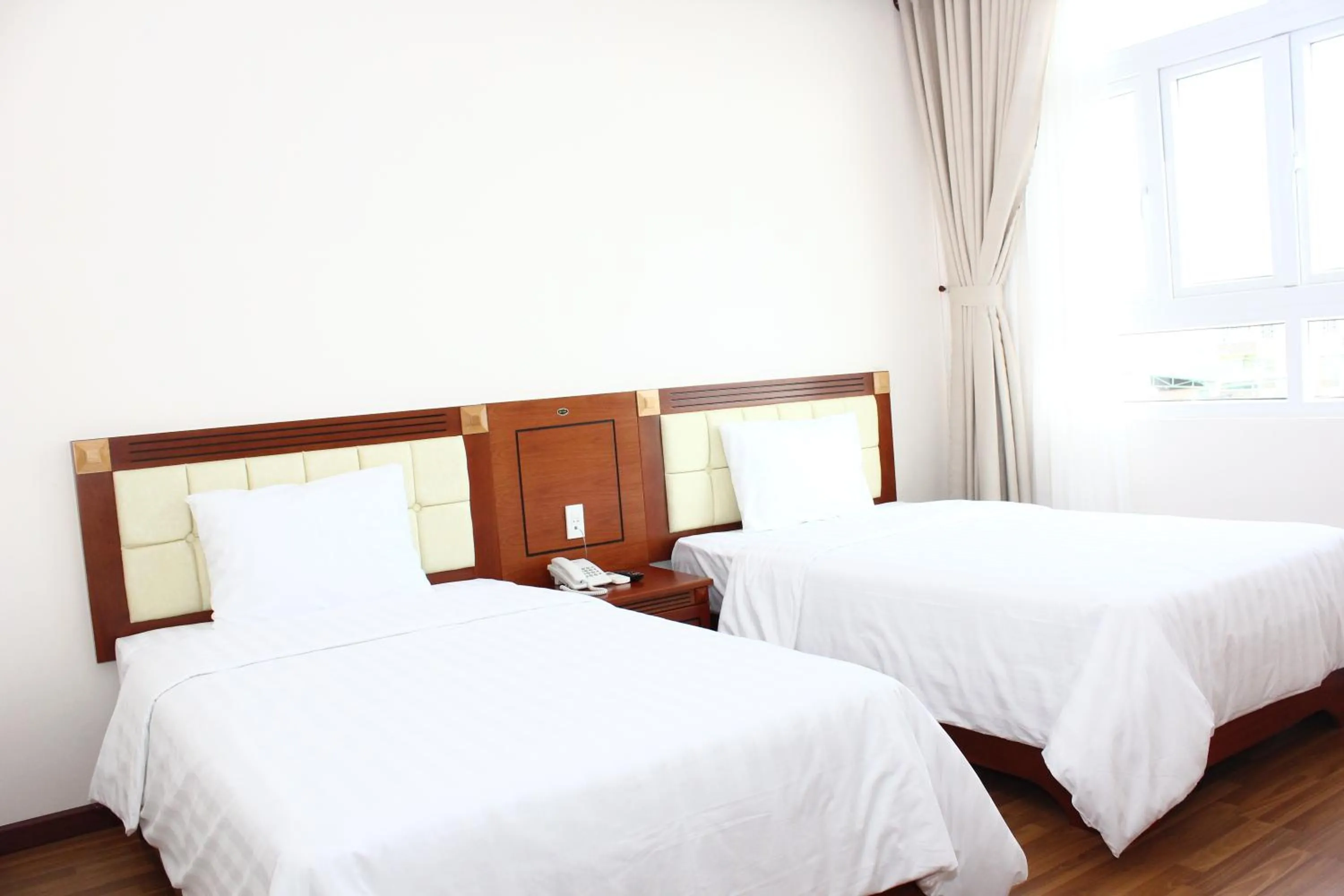 Photo of the whole room, Bed in Hoang Ngoc Hotel