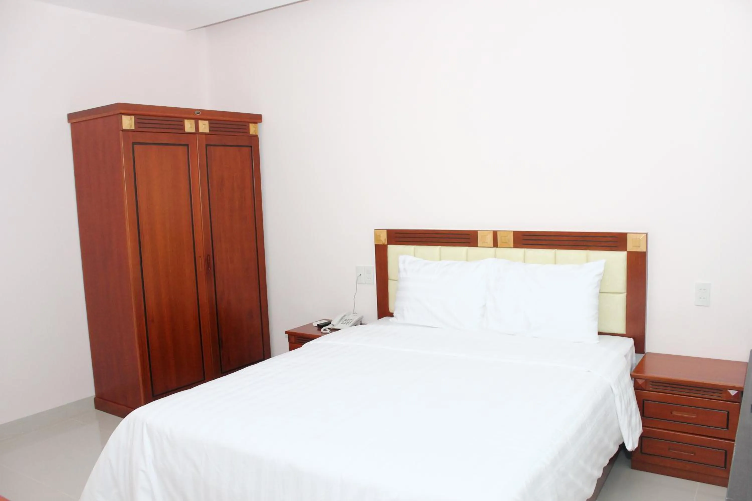Photo of the whole room, Bed in Hoang Ngoc Hotel