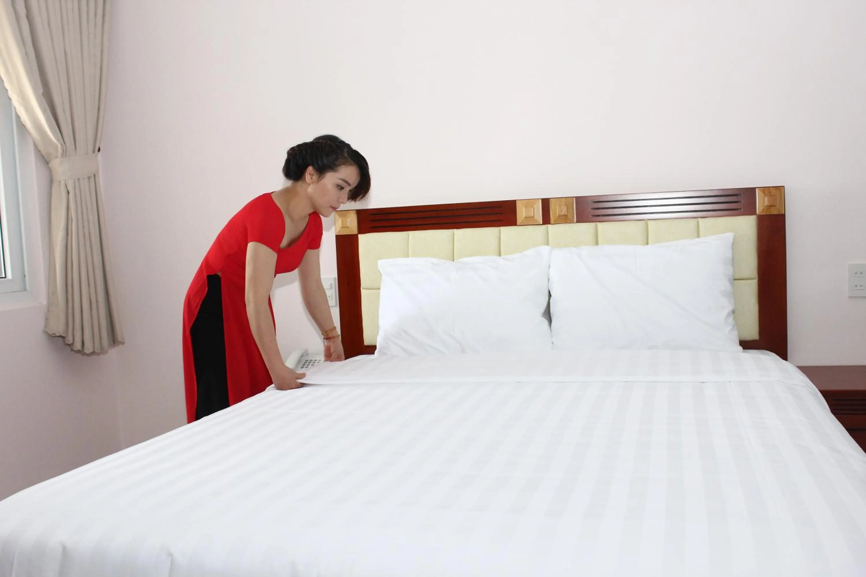 Photo of the whole room, Bed in Hoang Ngoc Hotel