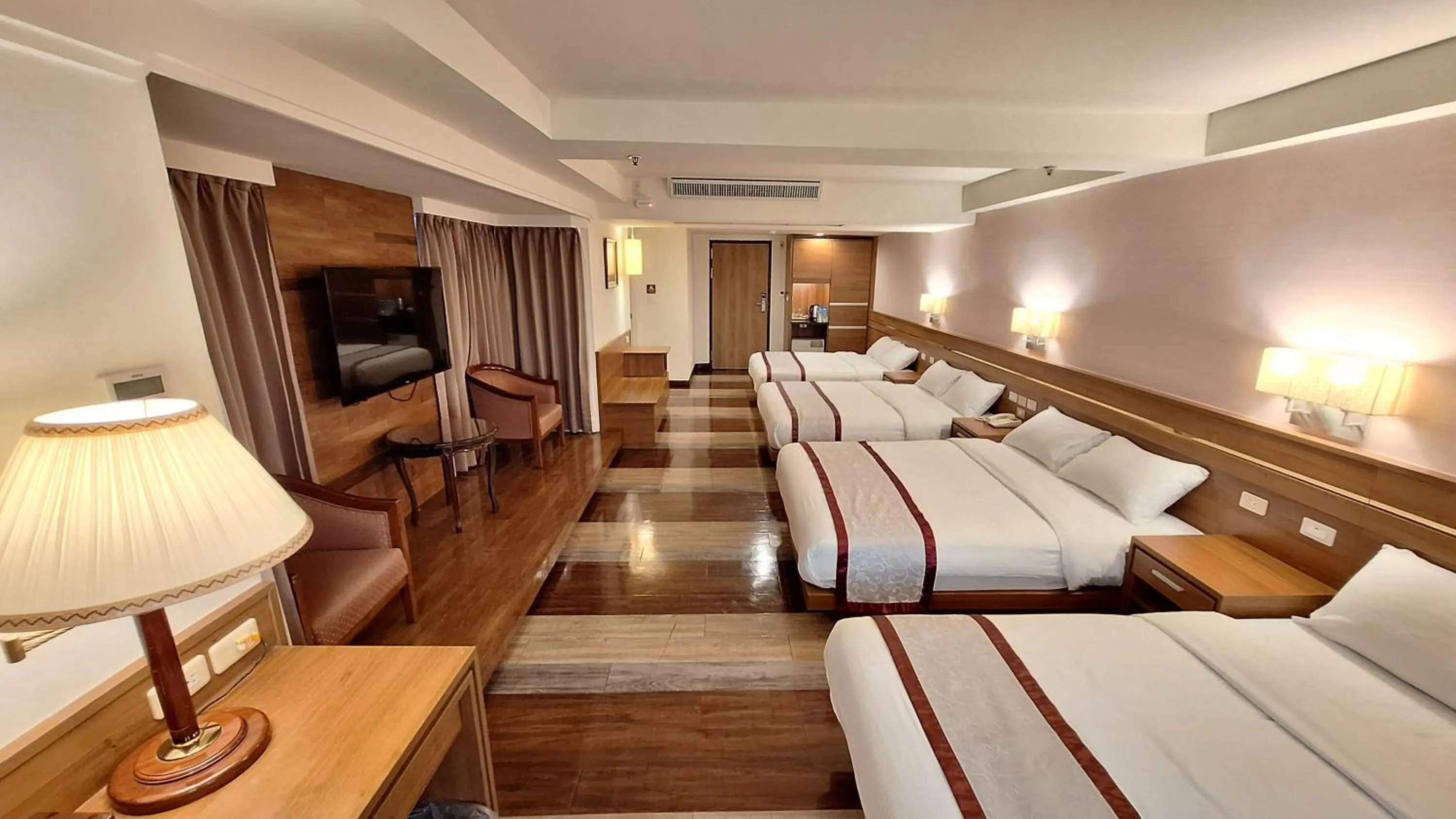 Bed in Cheng Pao Hotel