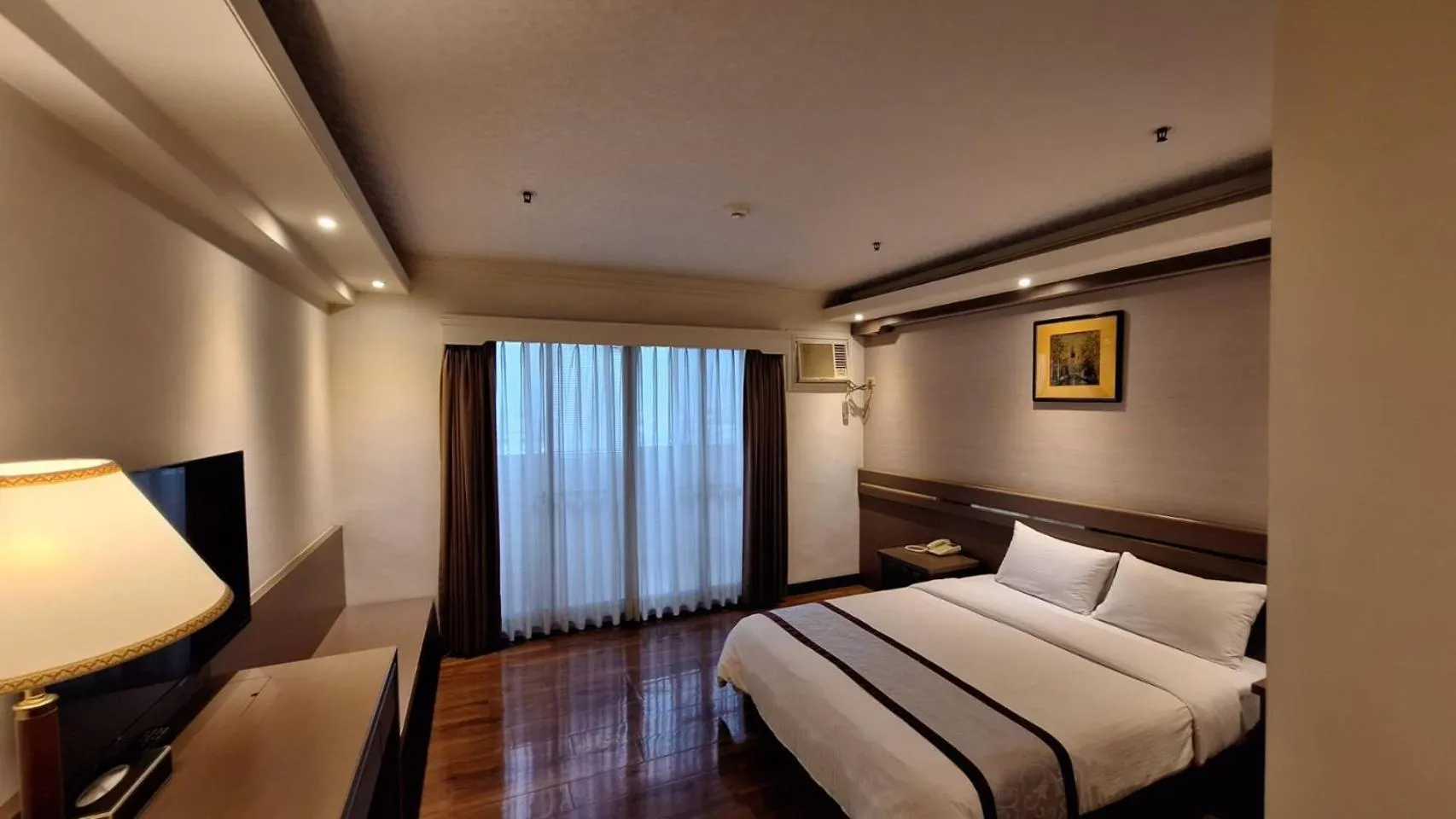 Bed in Cheng Pao Hotel