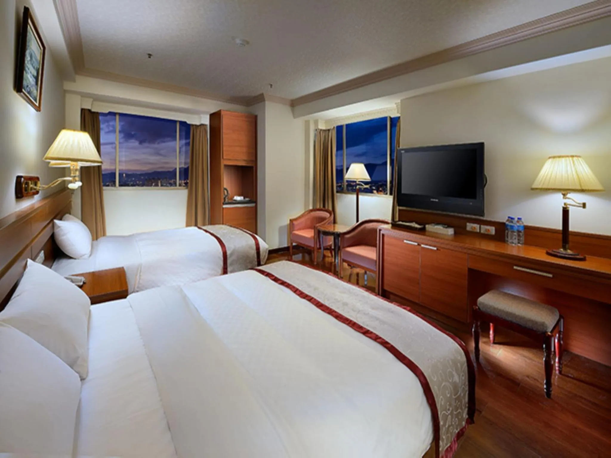 Bed in Cheng Pao Hotel