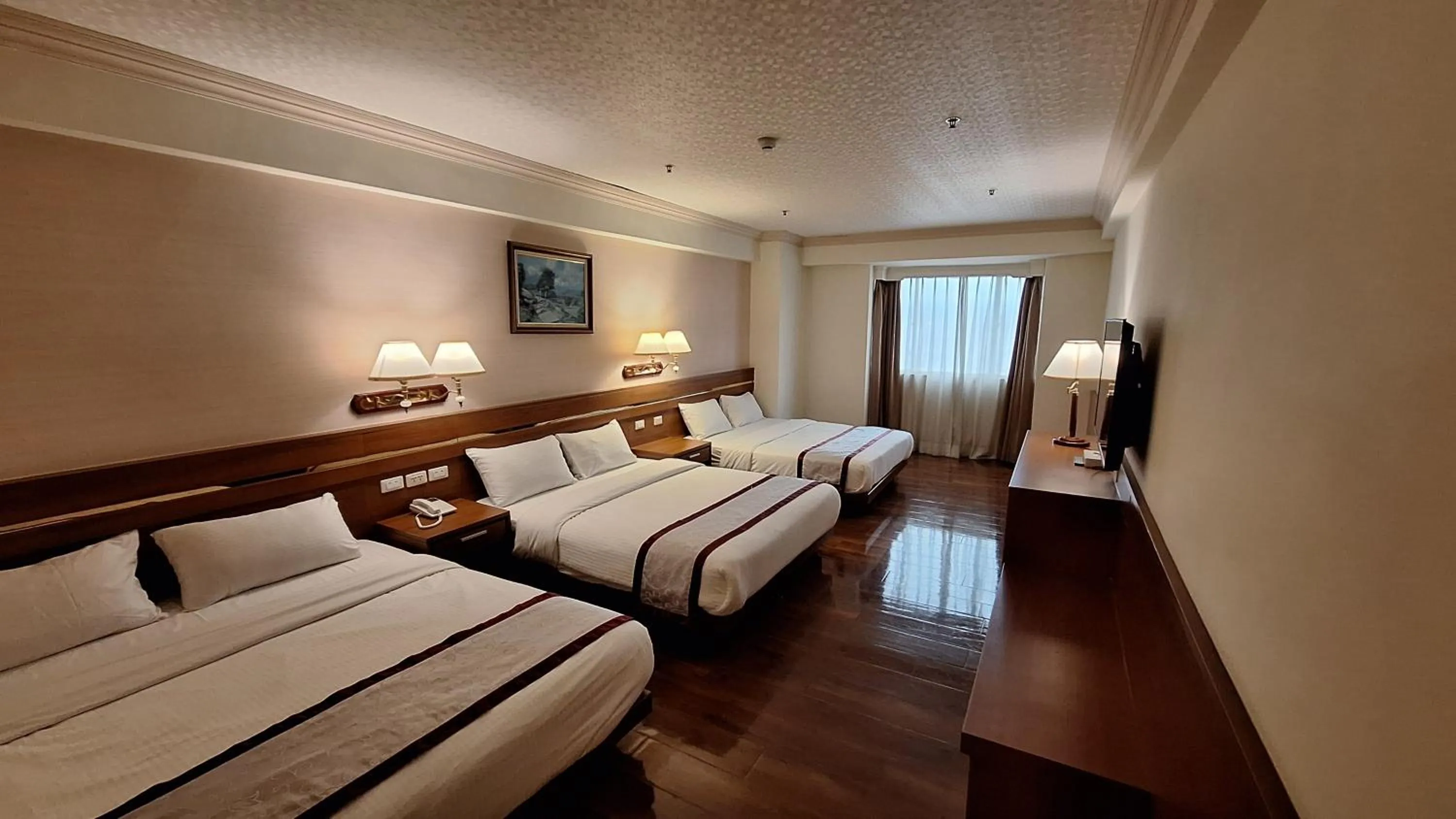 Bed in Cheng Pao Hotel