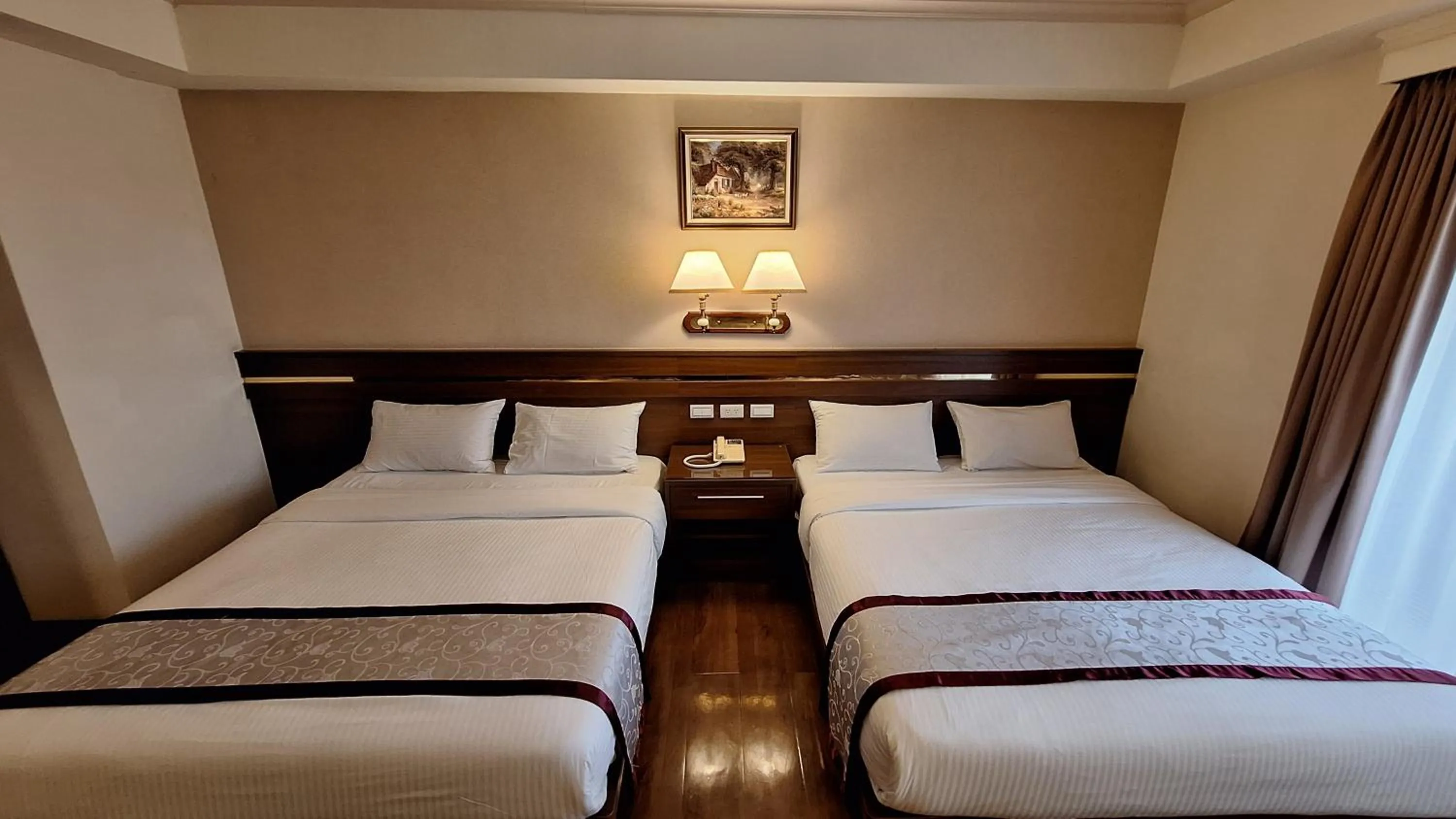 Bed in Cheng Pao Hotel