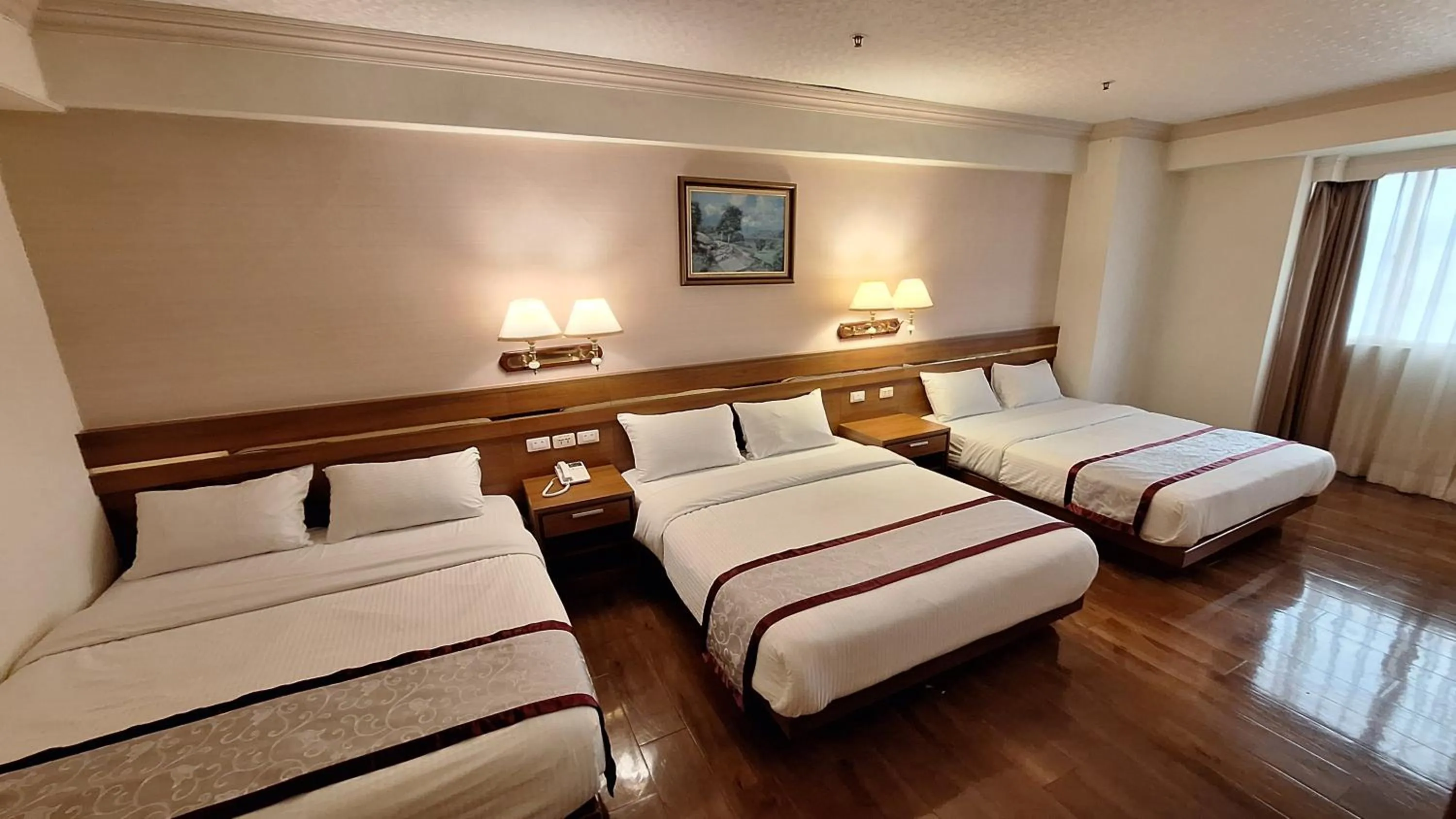 Bed in Cheng Pao Hotel