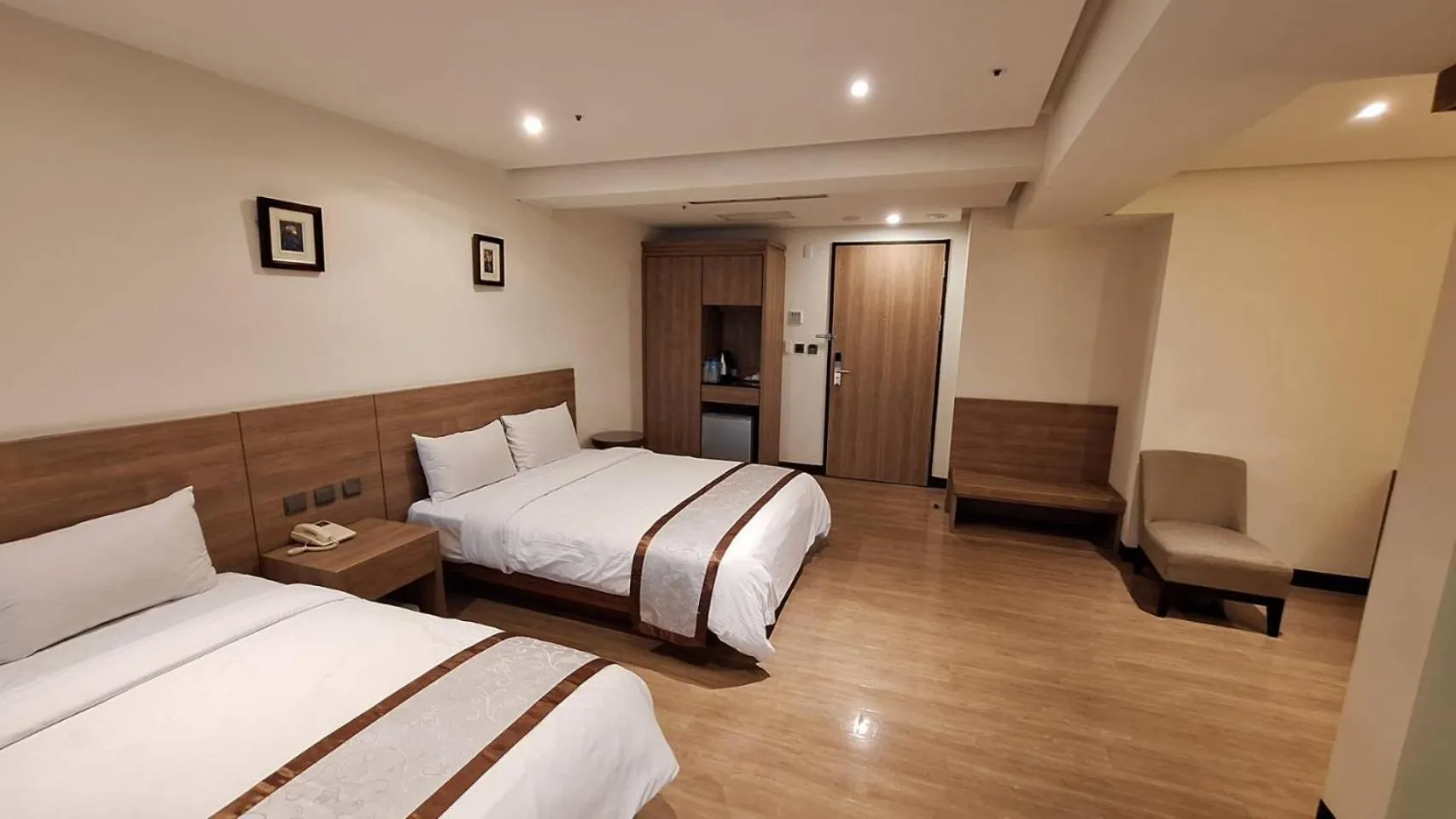 Bed in Cheng Pao Hotel