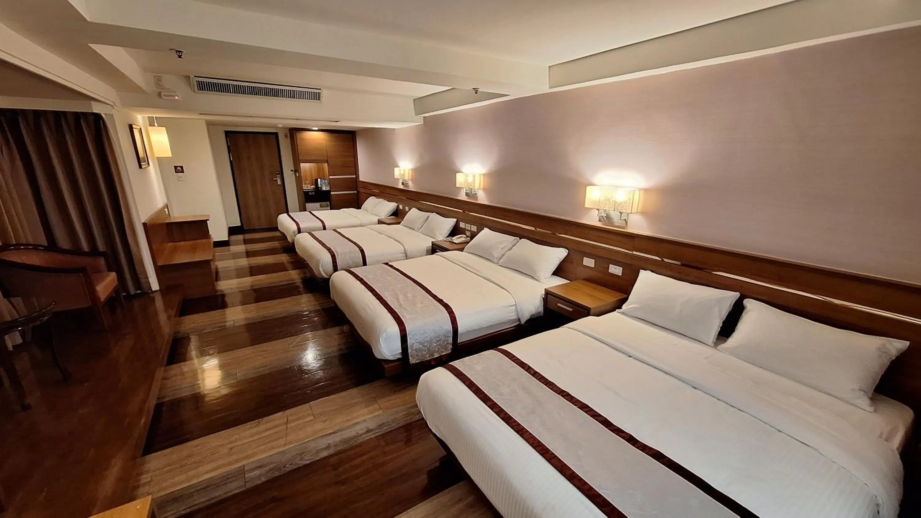 Bed in Cheng Pao Hotel