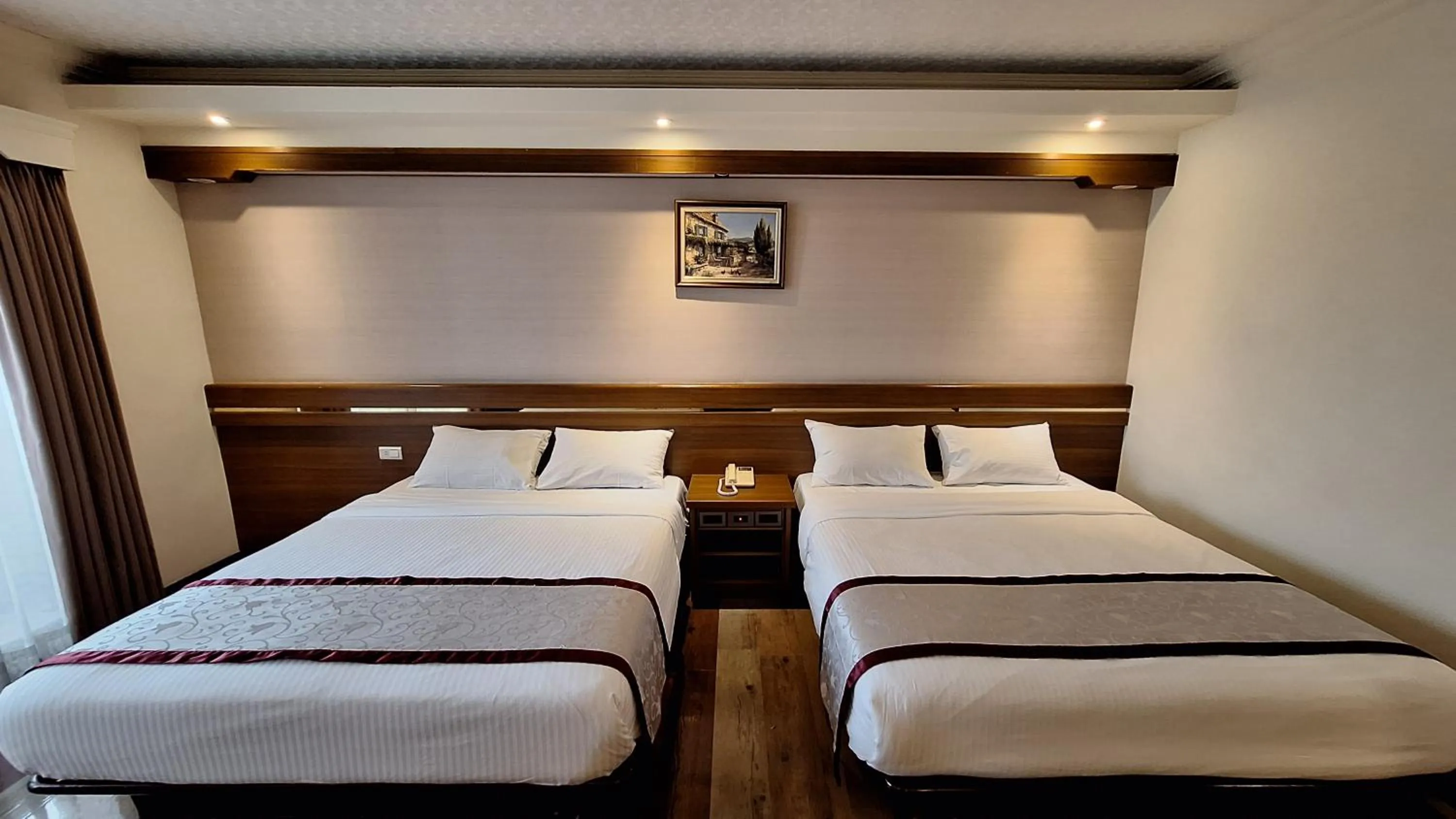 Bed in Cheng Pao Hotel