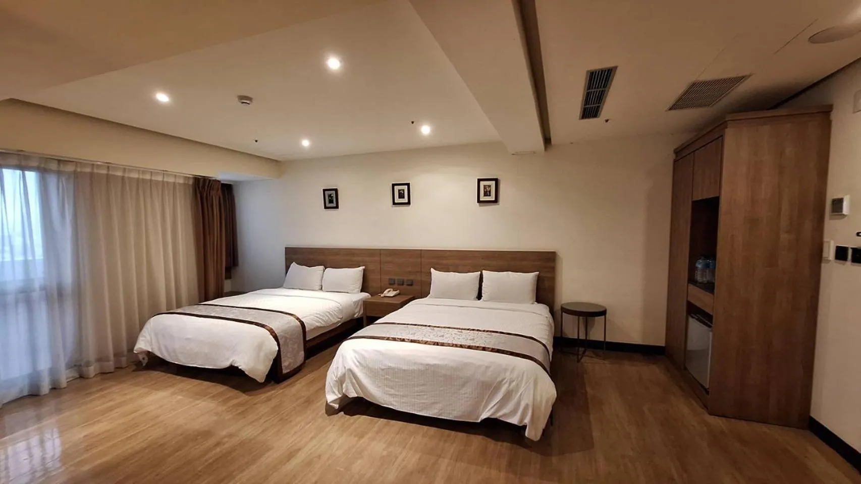 Bed in Cheng Pao Hotel