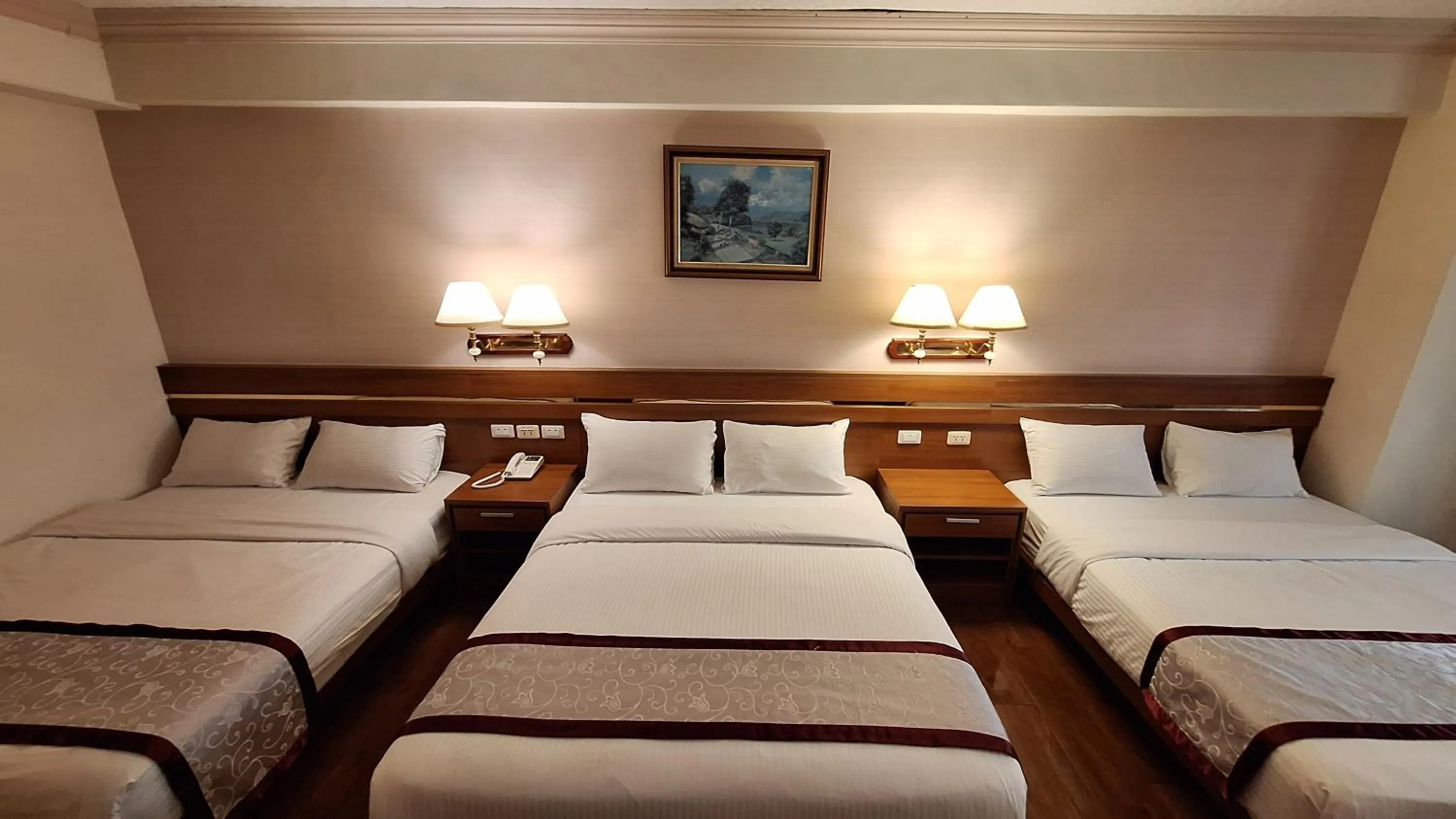 Bed in Cheng Pao Hotel