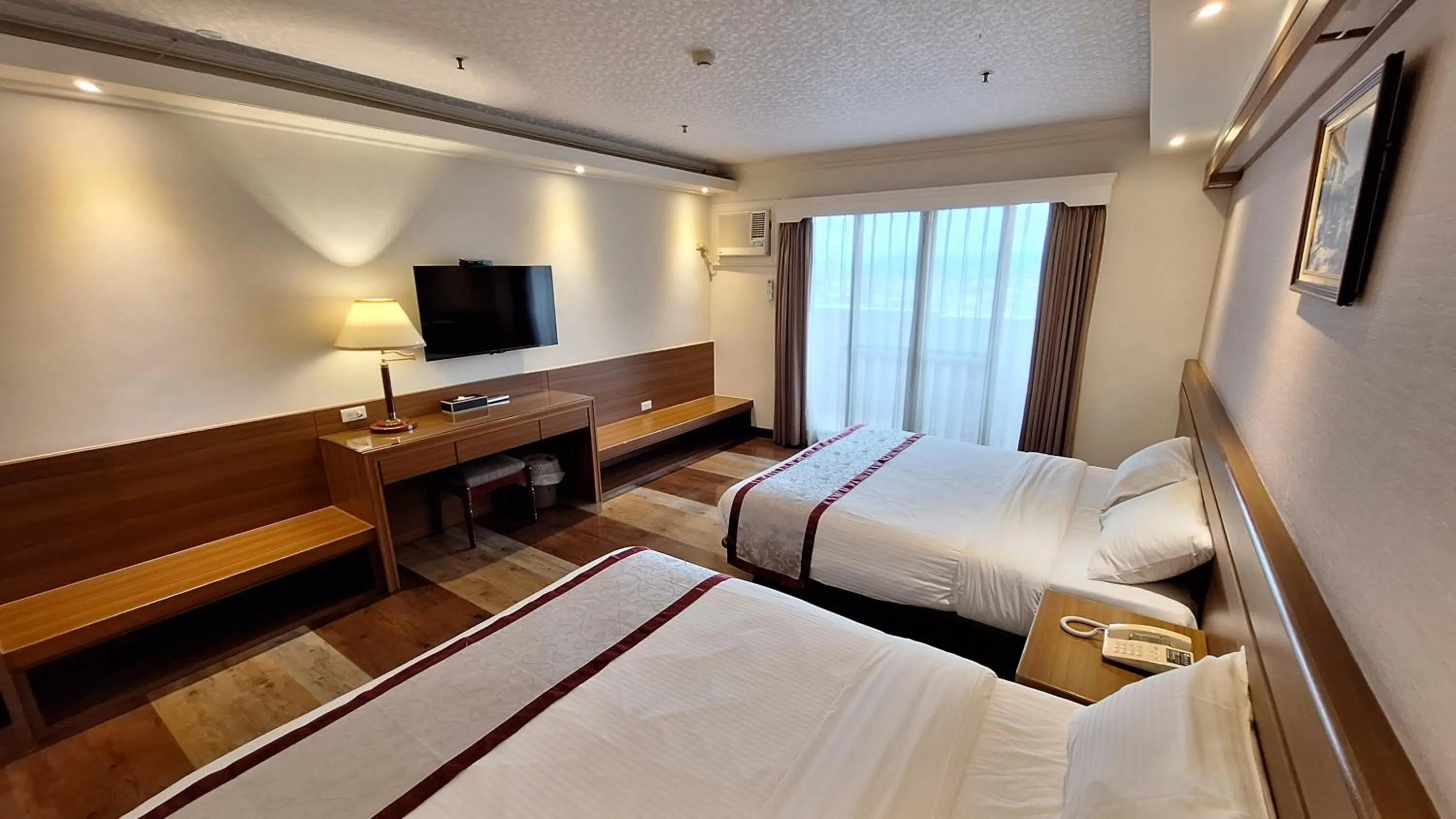 Bed in Cheng Pao Hotel