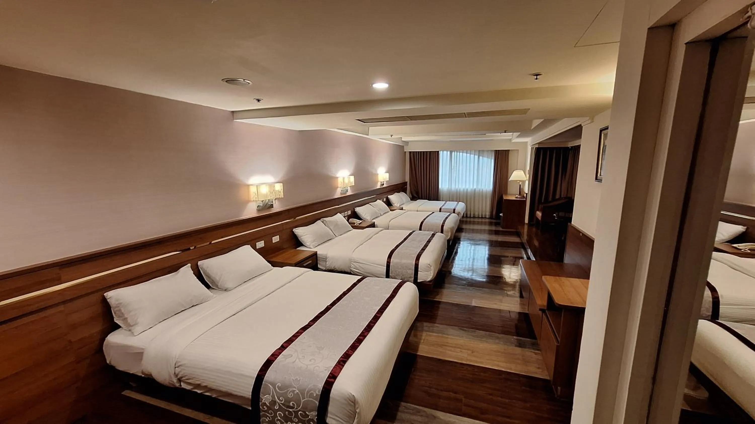 Bed in Cheng Pao Hotel