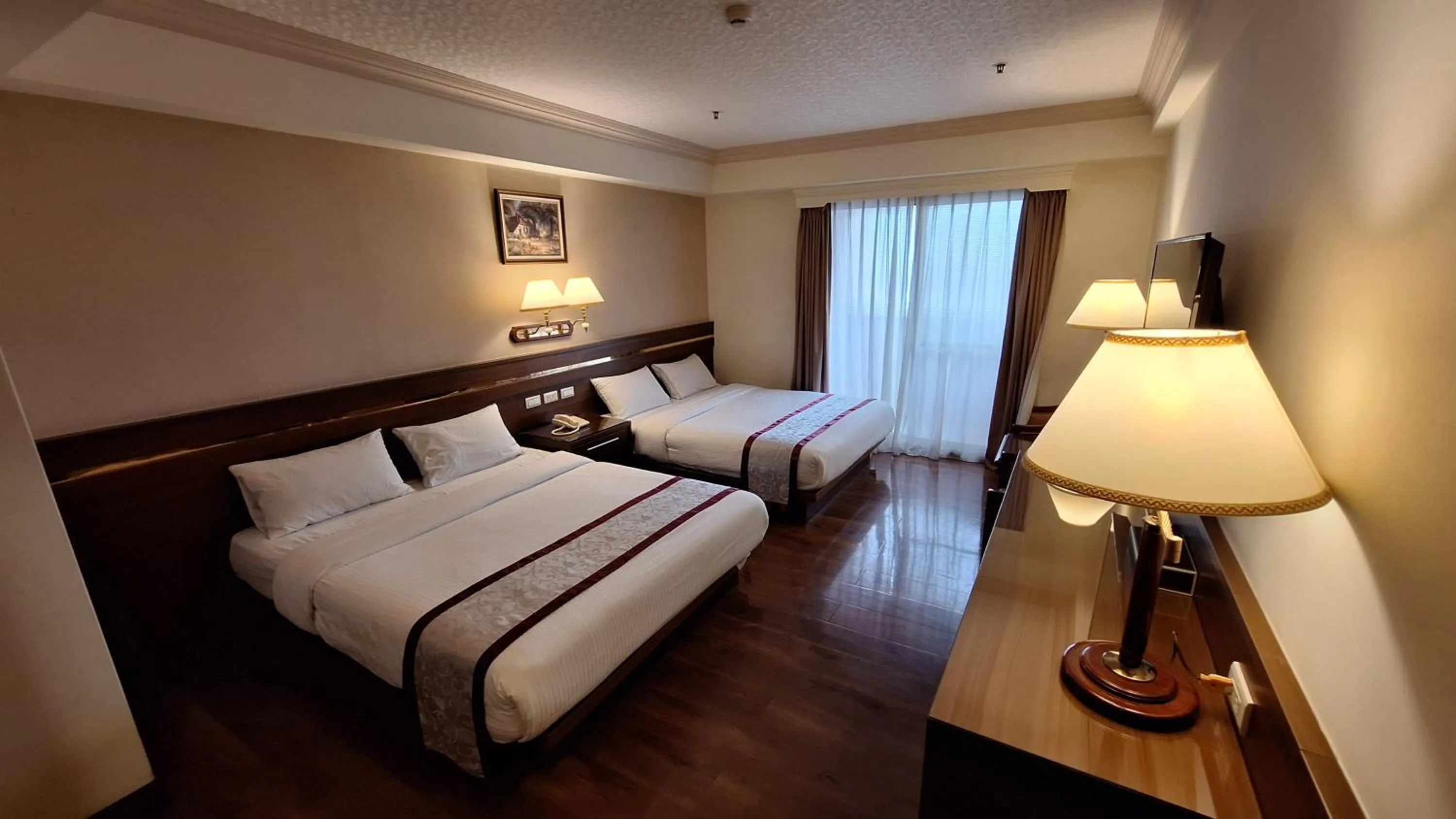 Bed in Cheng Pao Hotel