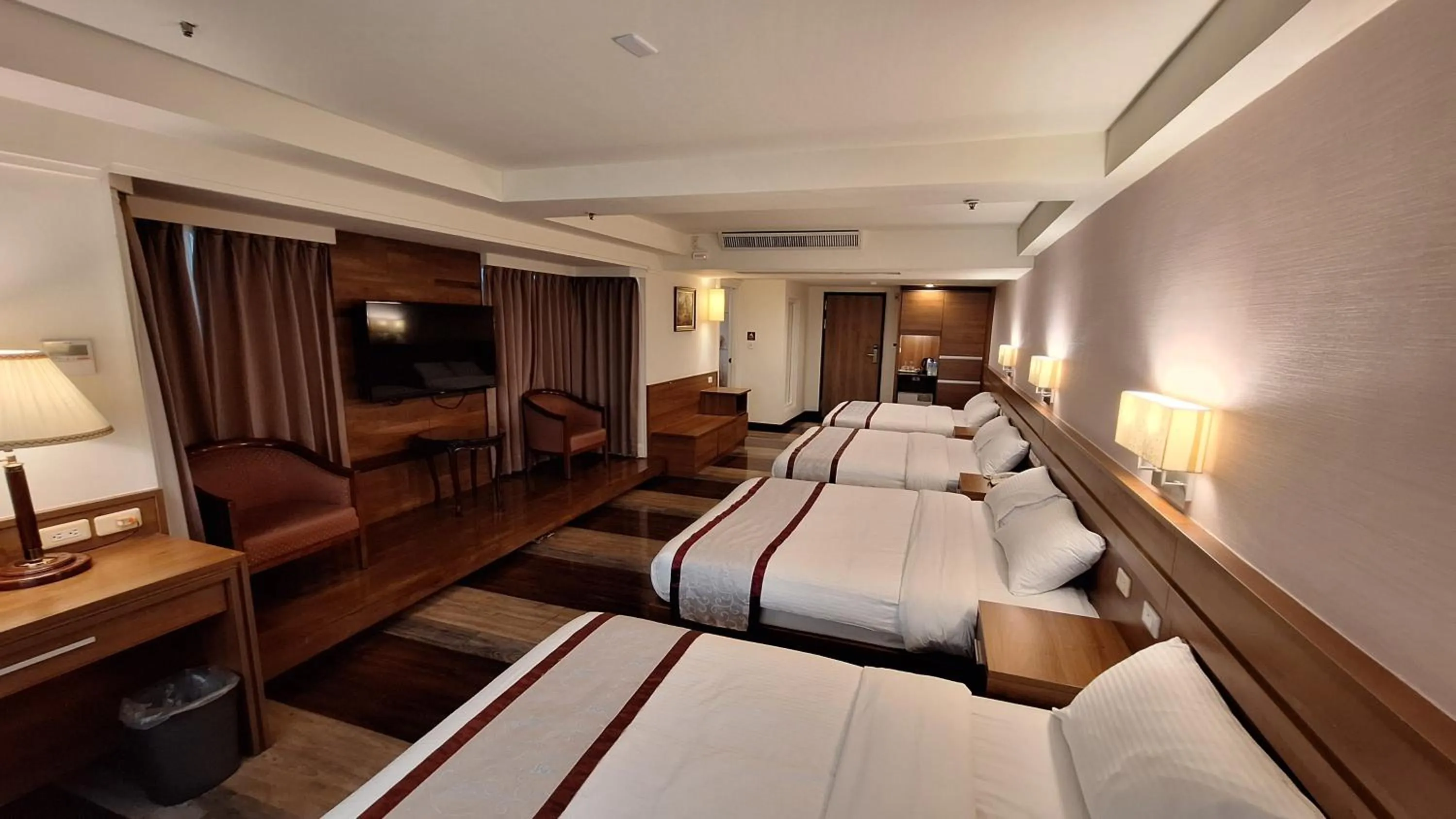 Bed in Cheng Pao Hotel