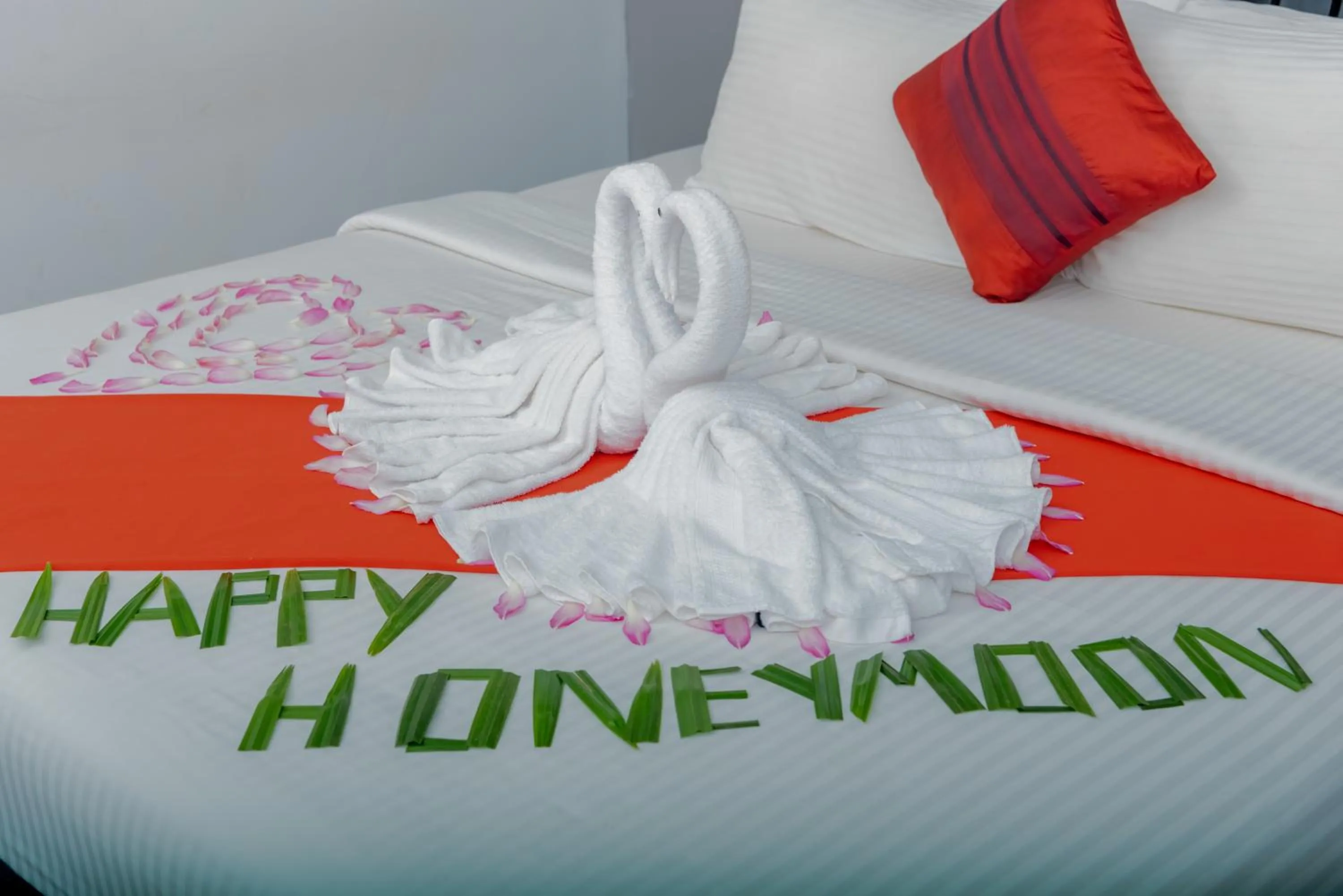 Bed in New Riverside Hotel