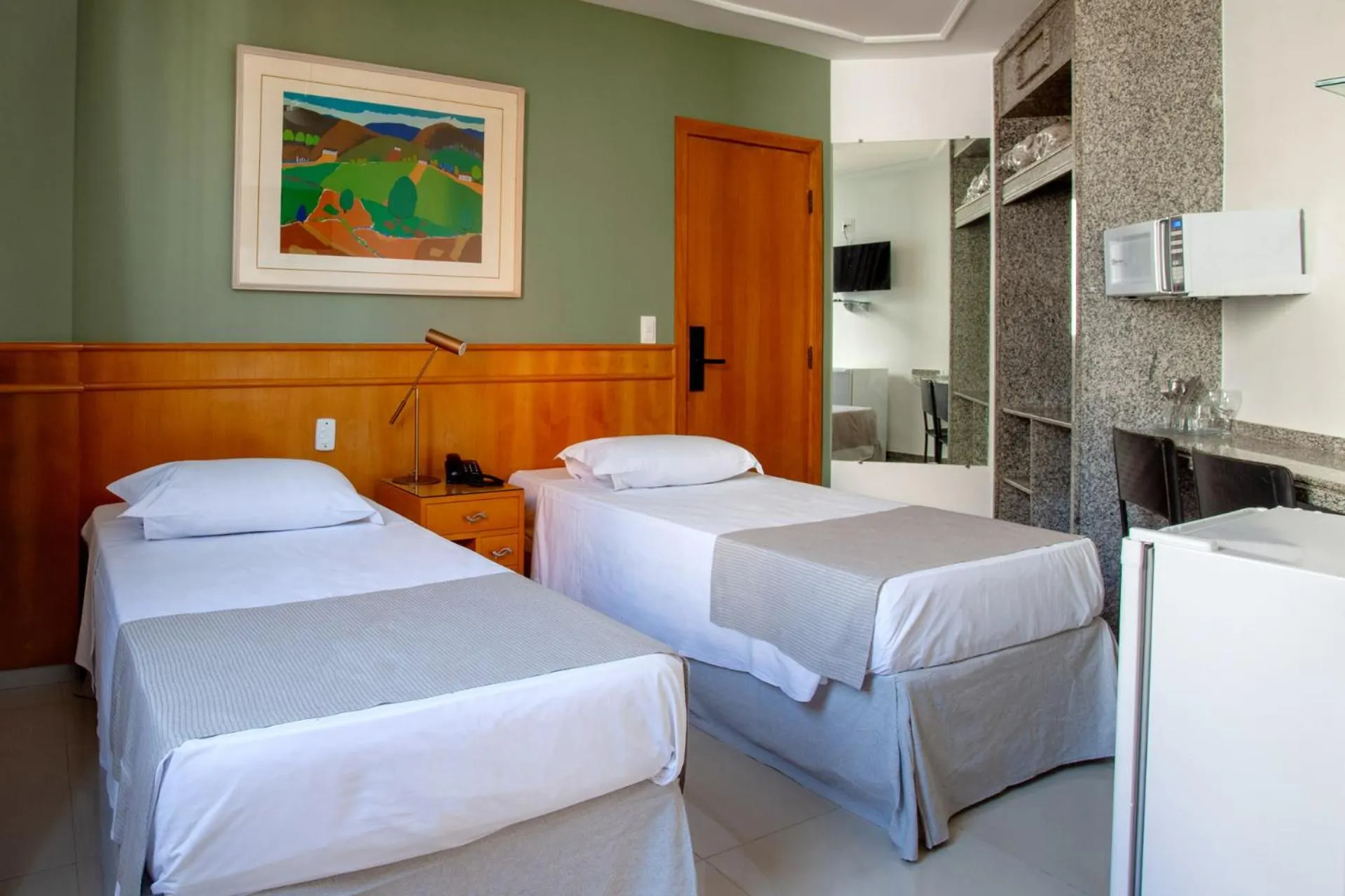 Photo of the whole room, Bed in Savassinho Hotel & Residence