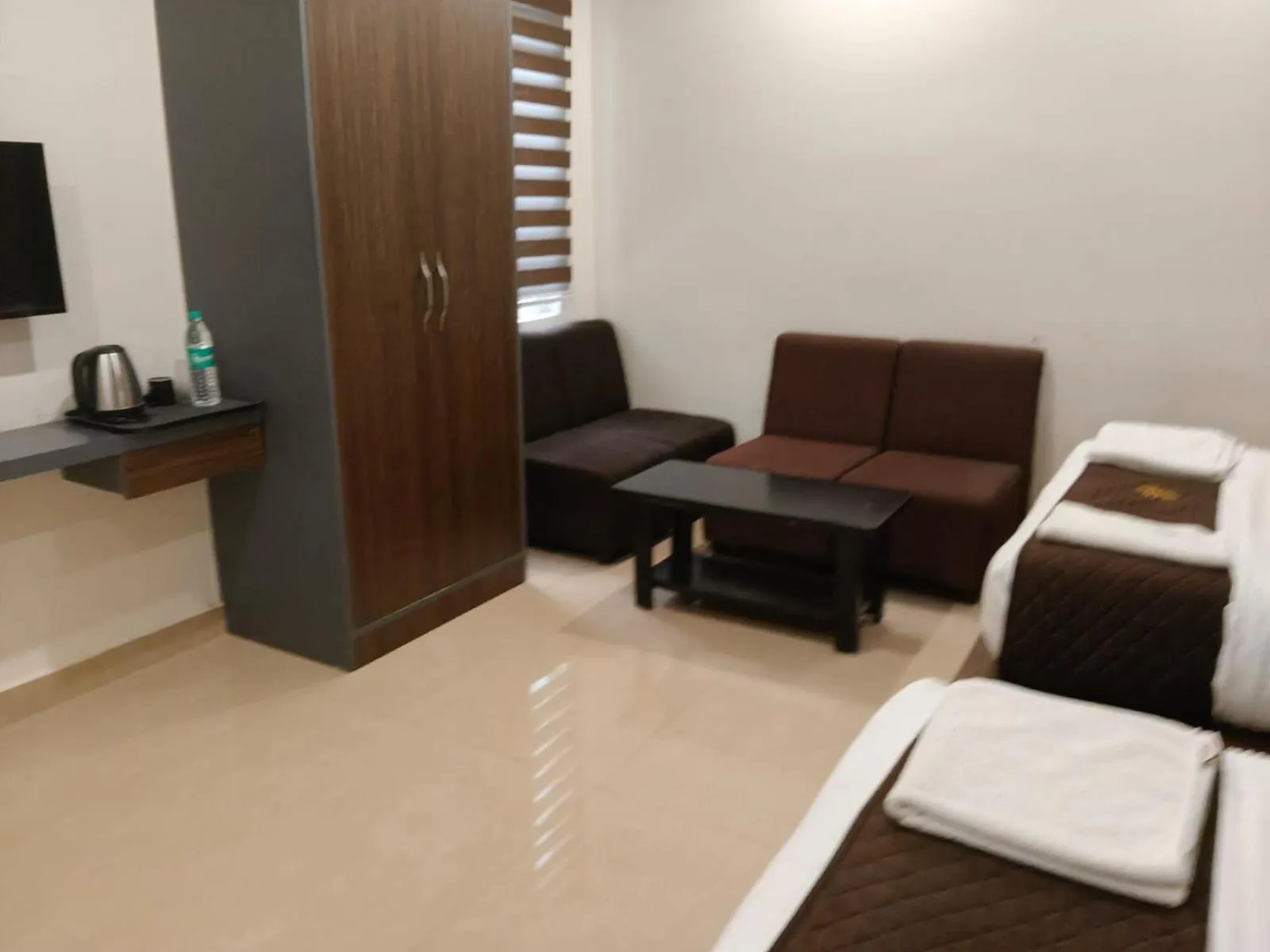 Seating area in Senthur Inn By K Hotels